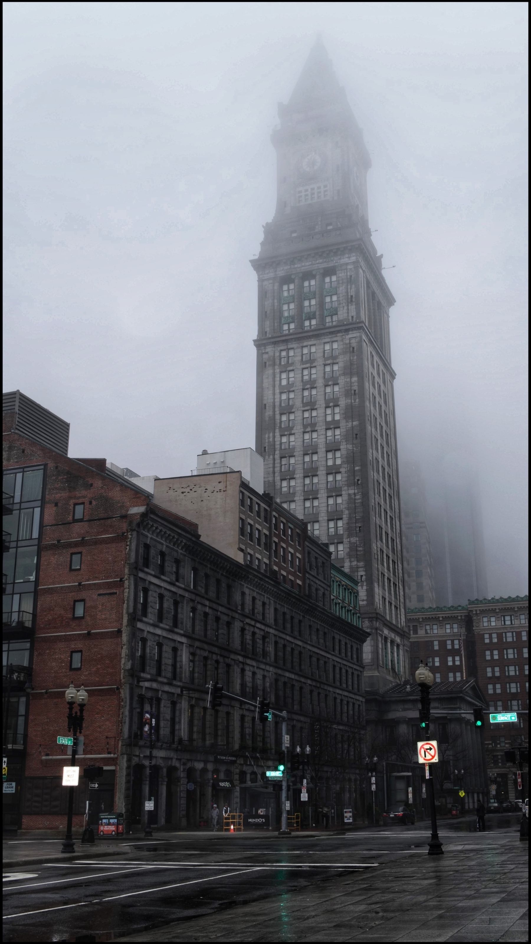 It was a dark and stormy/gloomy/rainy/foggy day in Downtown Boston. 