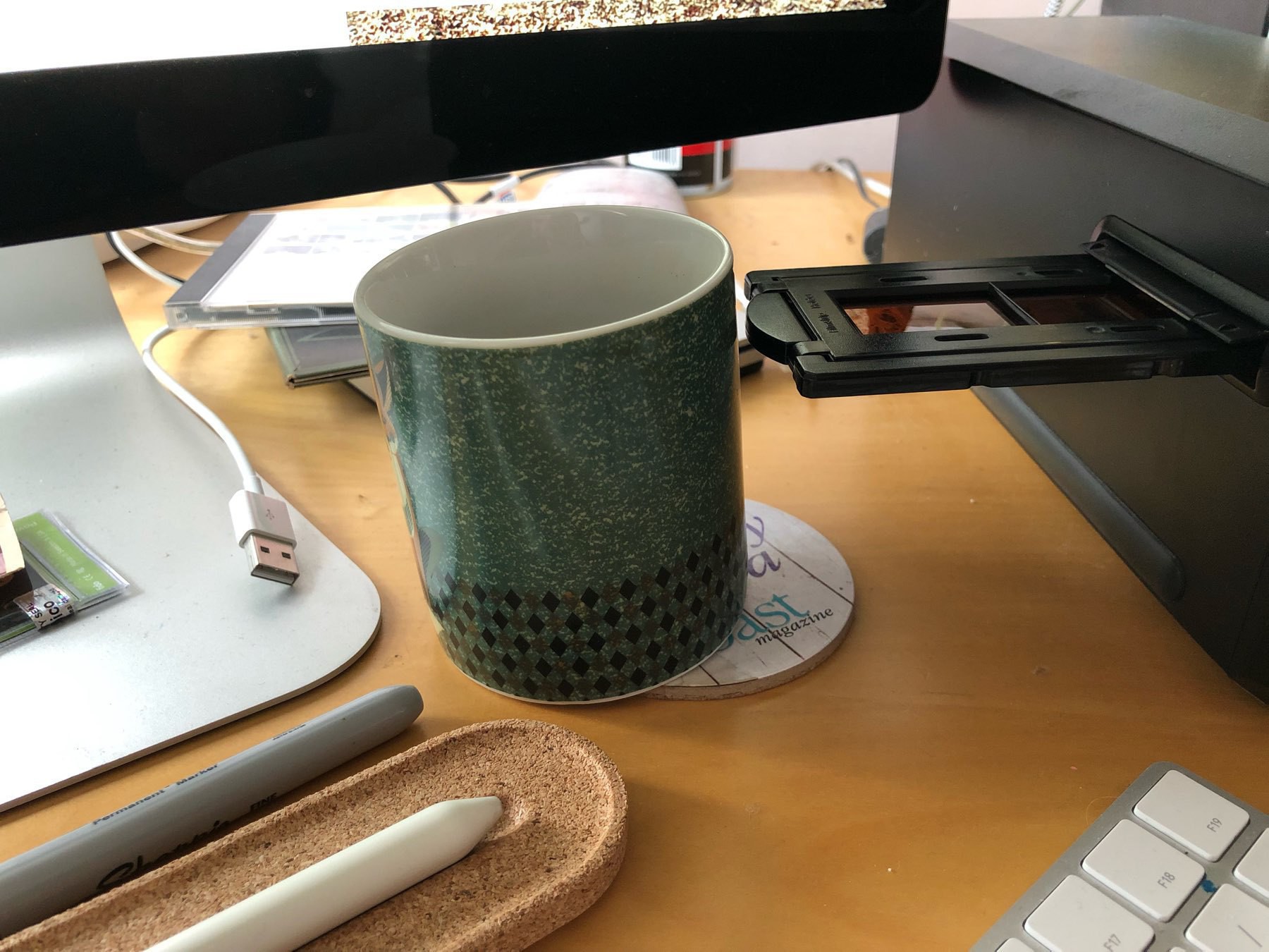 My coffee mug being knocked by my film scanner