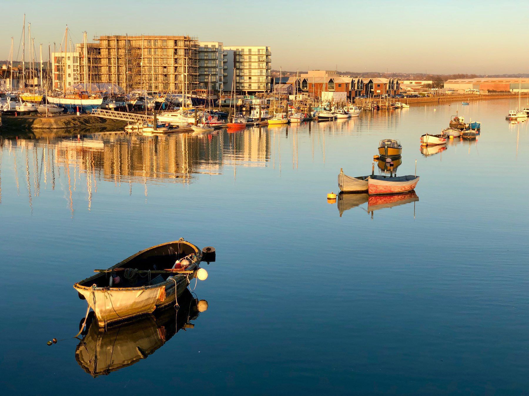 Evening light on boats in the river Adur