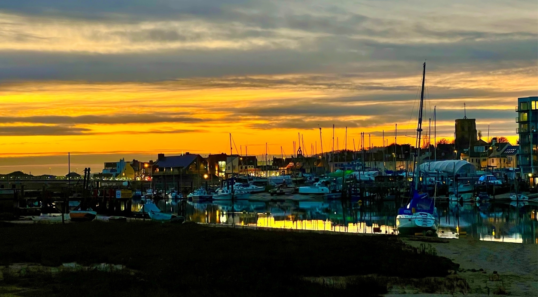 Sunset over Shoreham-by-Sea from the Emerald Quay slipway.