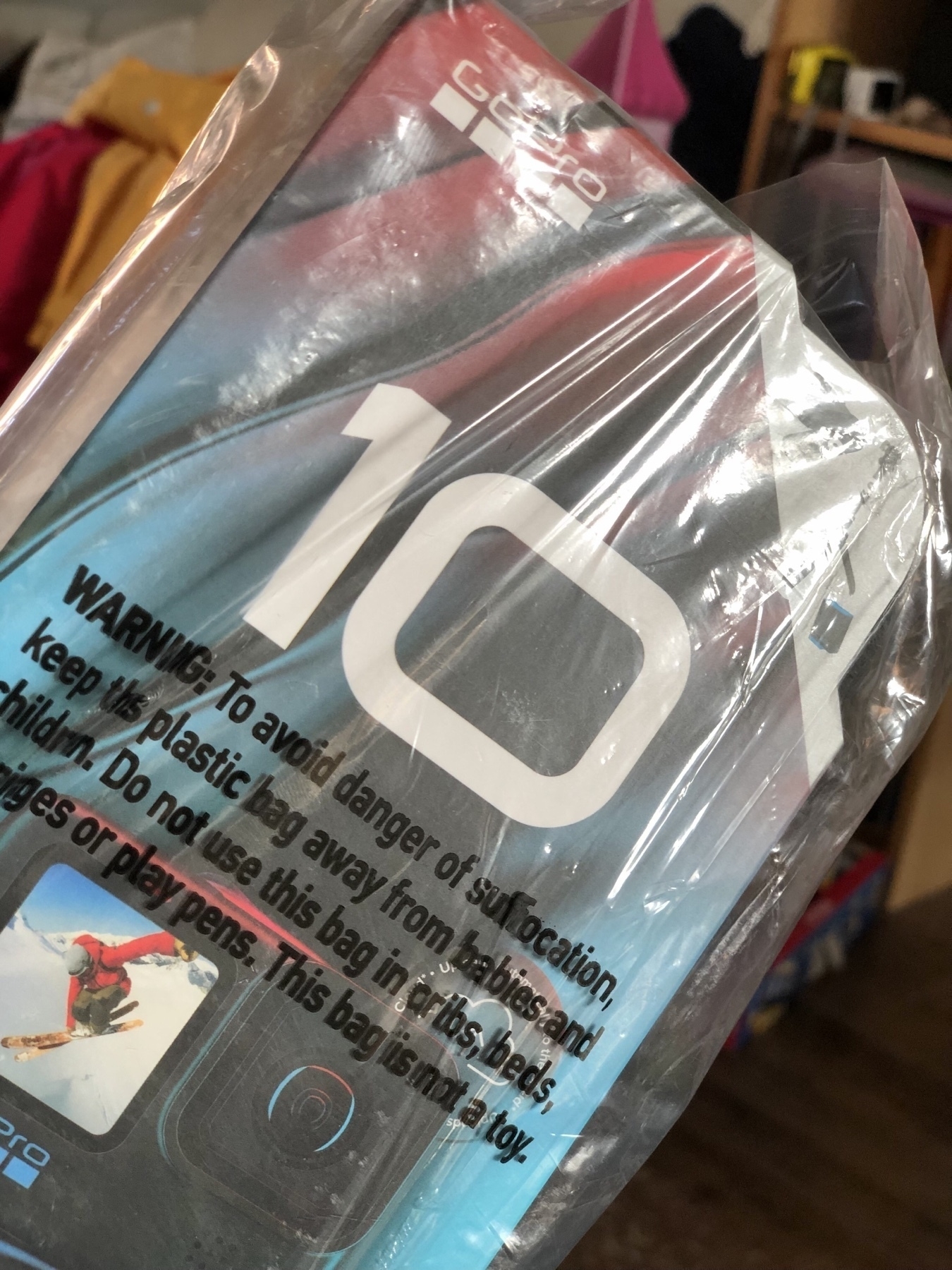 A GoPro Hero 10 in its shipping packaging. 