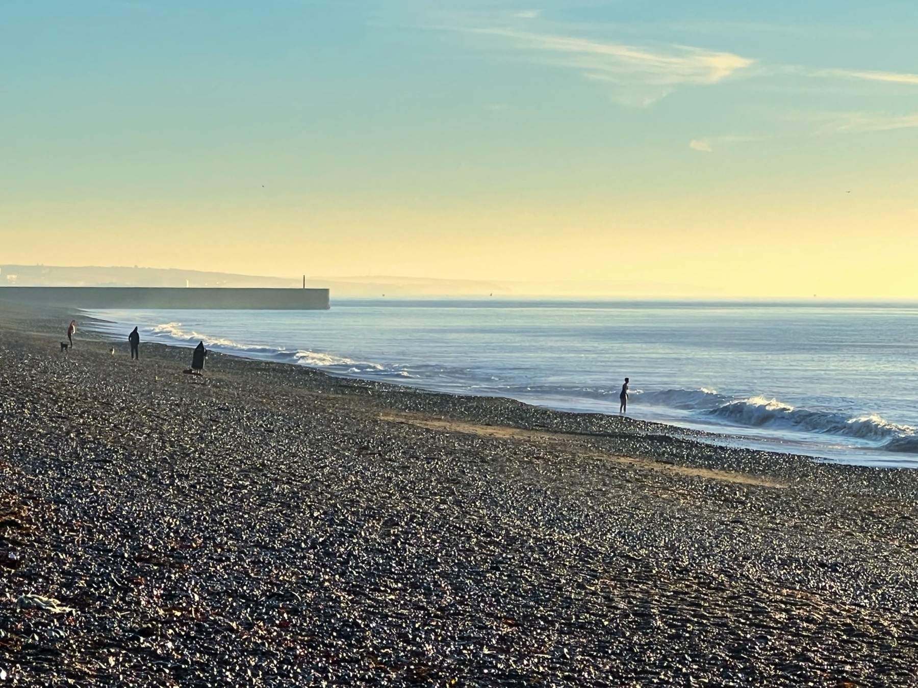 Sea swimmers off Shoreham Beach on a freezing winter morning. 