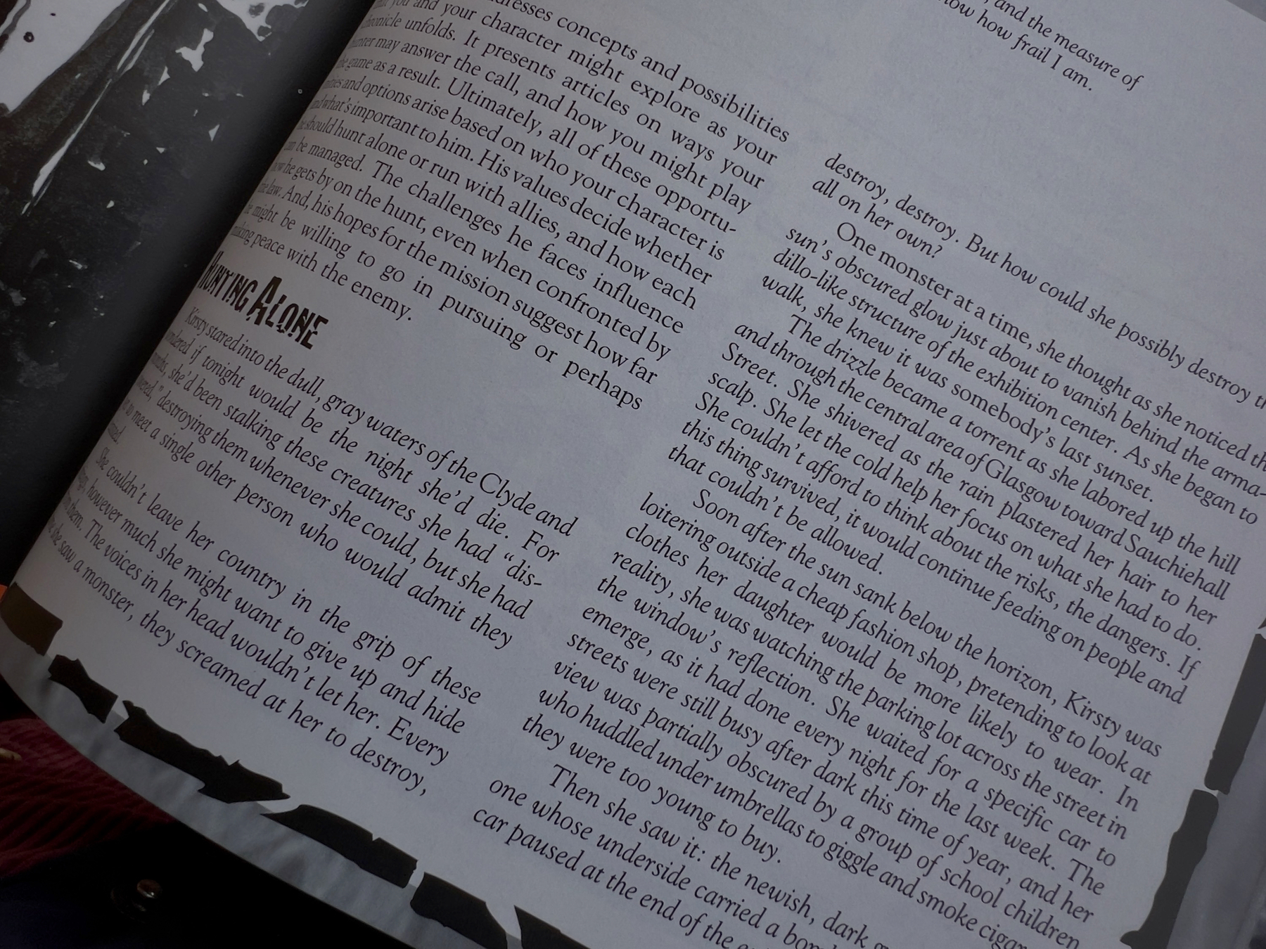 A book page with English text and subtle illustrations in the margins.