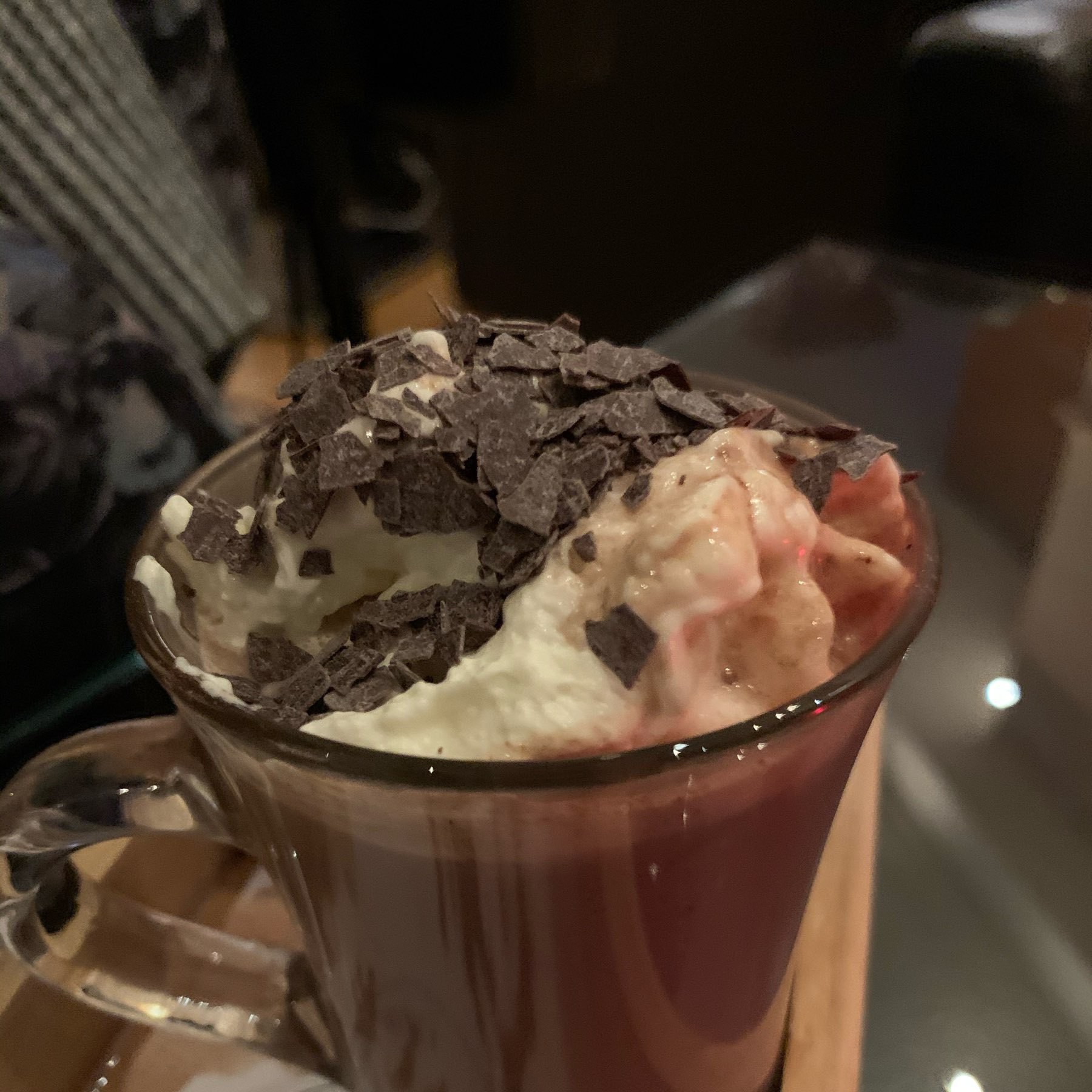 hot chocolate with whipped cream and chocolate shavings