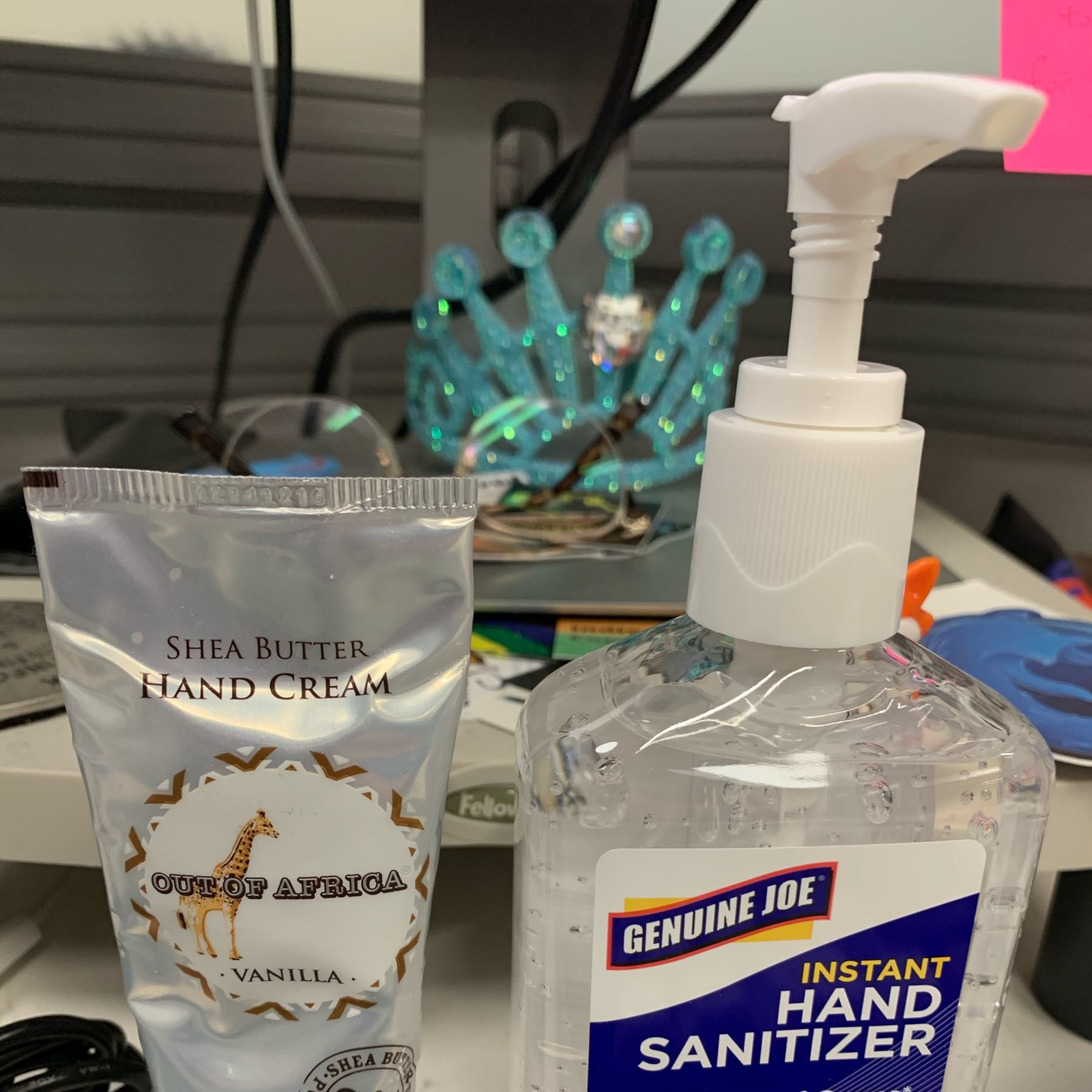 a photo of a tube of shea butter hand lotion, and a pump bottle of hand sanitizer