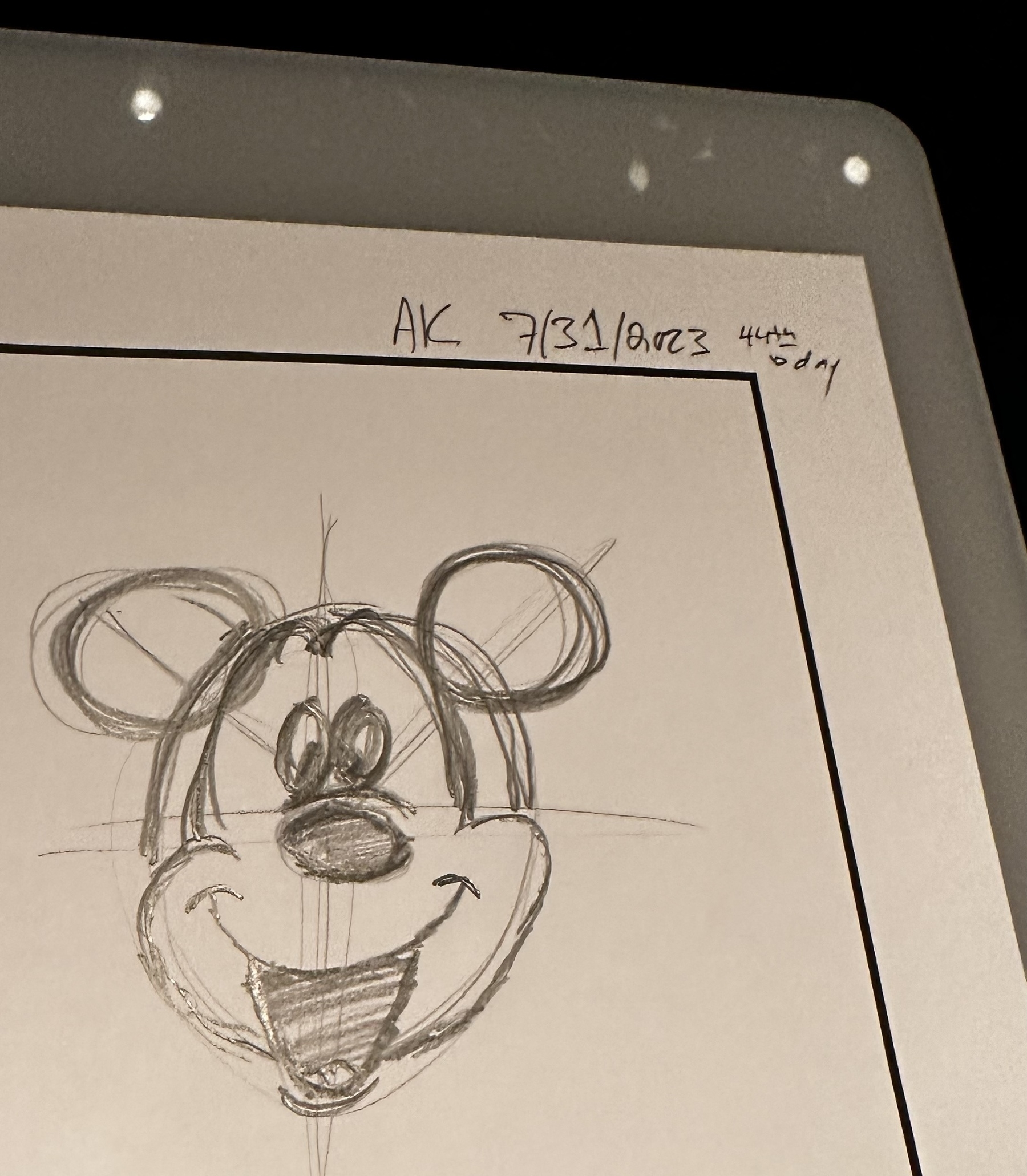 A pencil sketch of Mickey Mouse