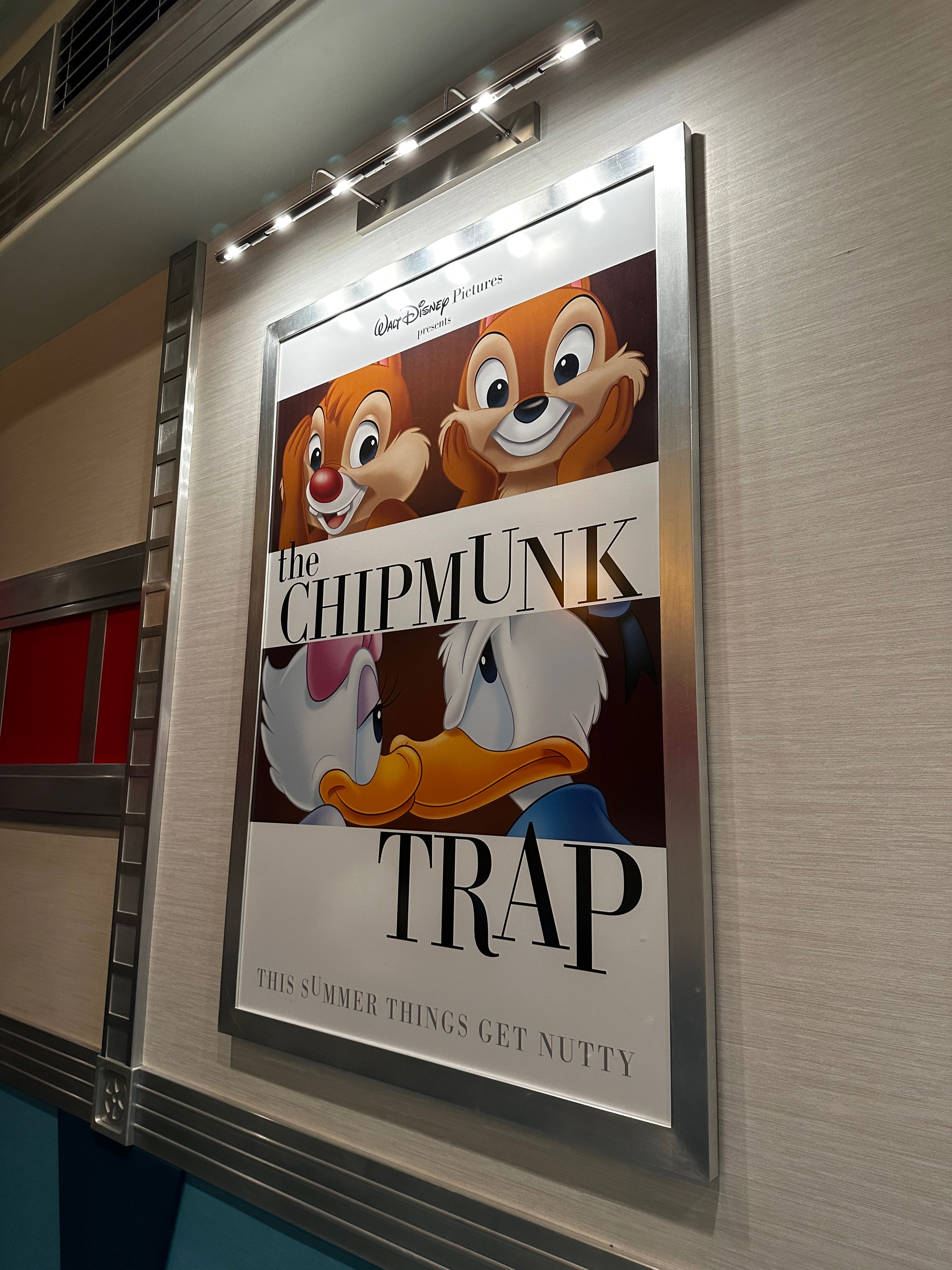 Movie poster for the speculative “The Chipmunk Trap” in a ride queue