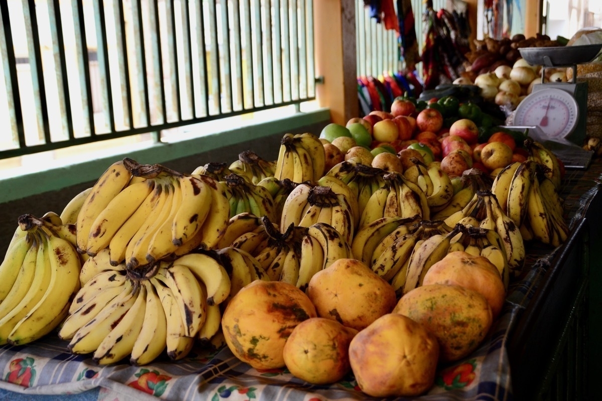 Bananas and other fruit on a market stall
