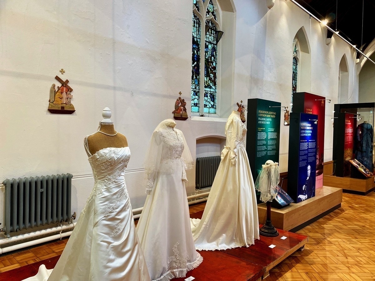 Exhibition of wedding dresses in a church