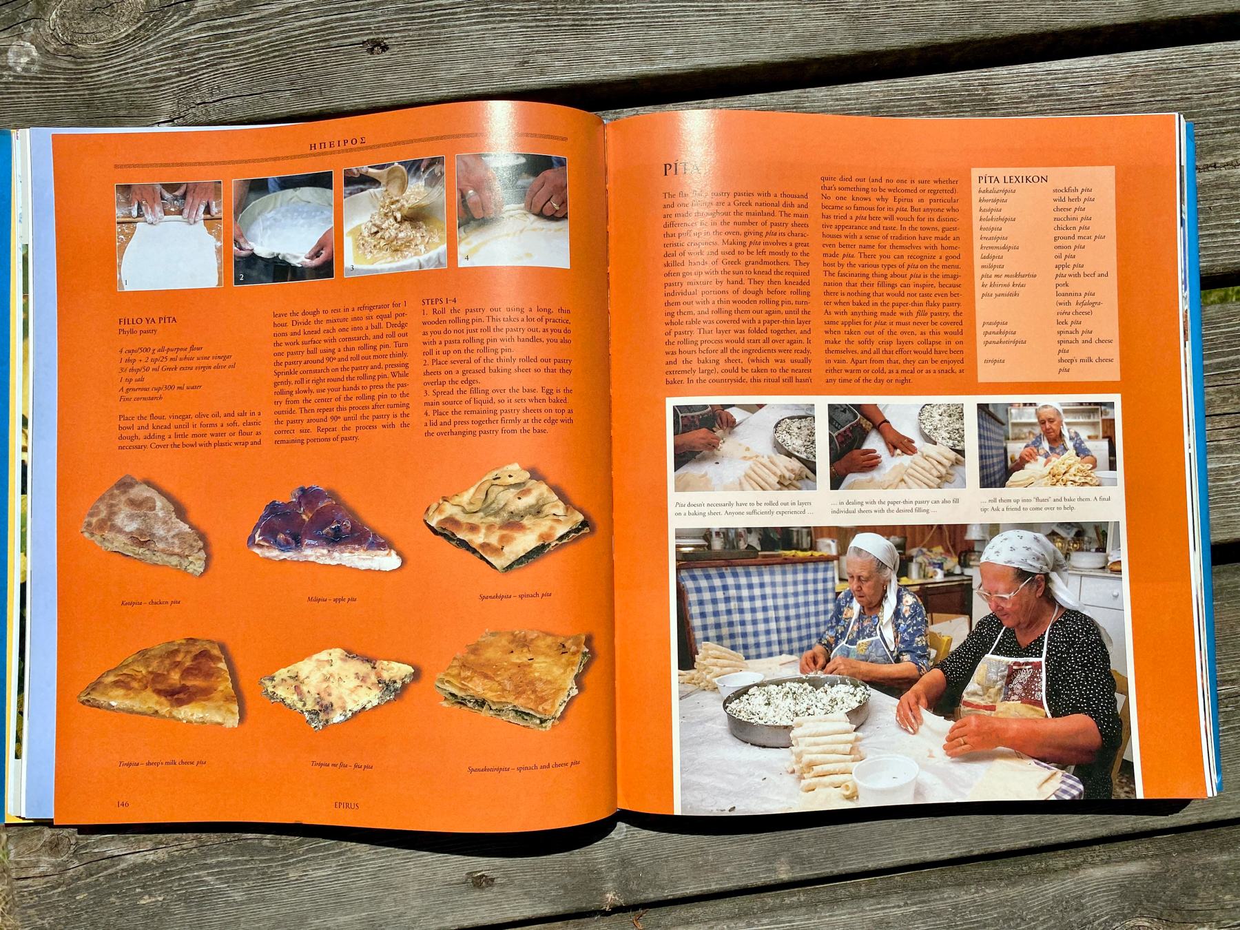 Open Greek cookery book showing a selection of pies and pita