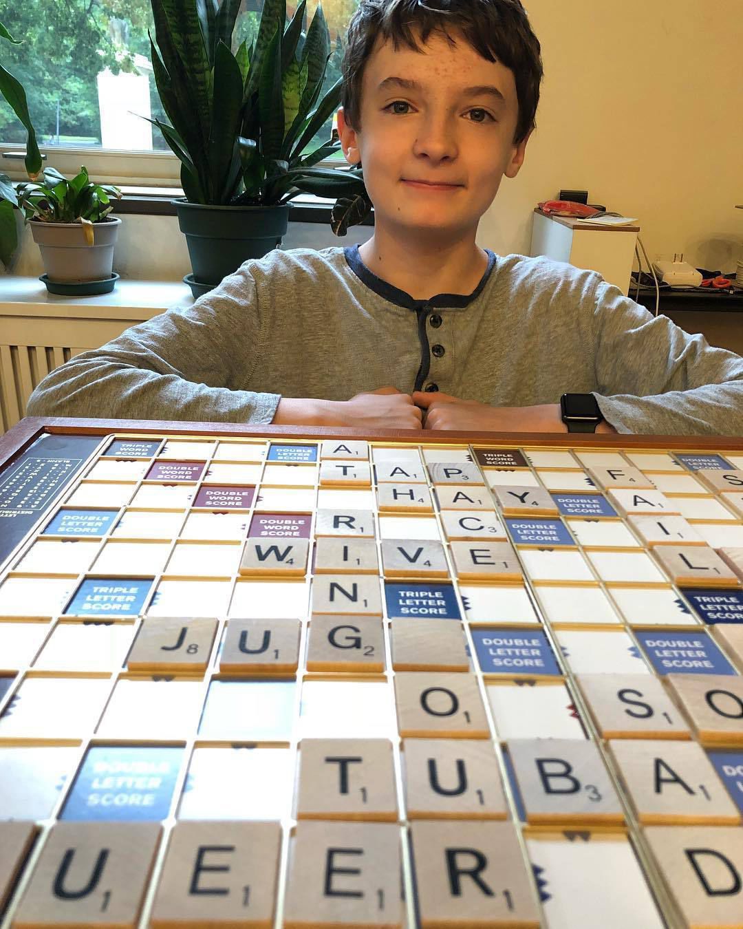 A boy and his Scrabble board
