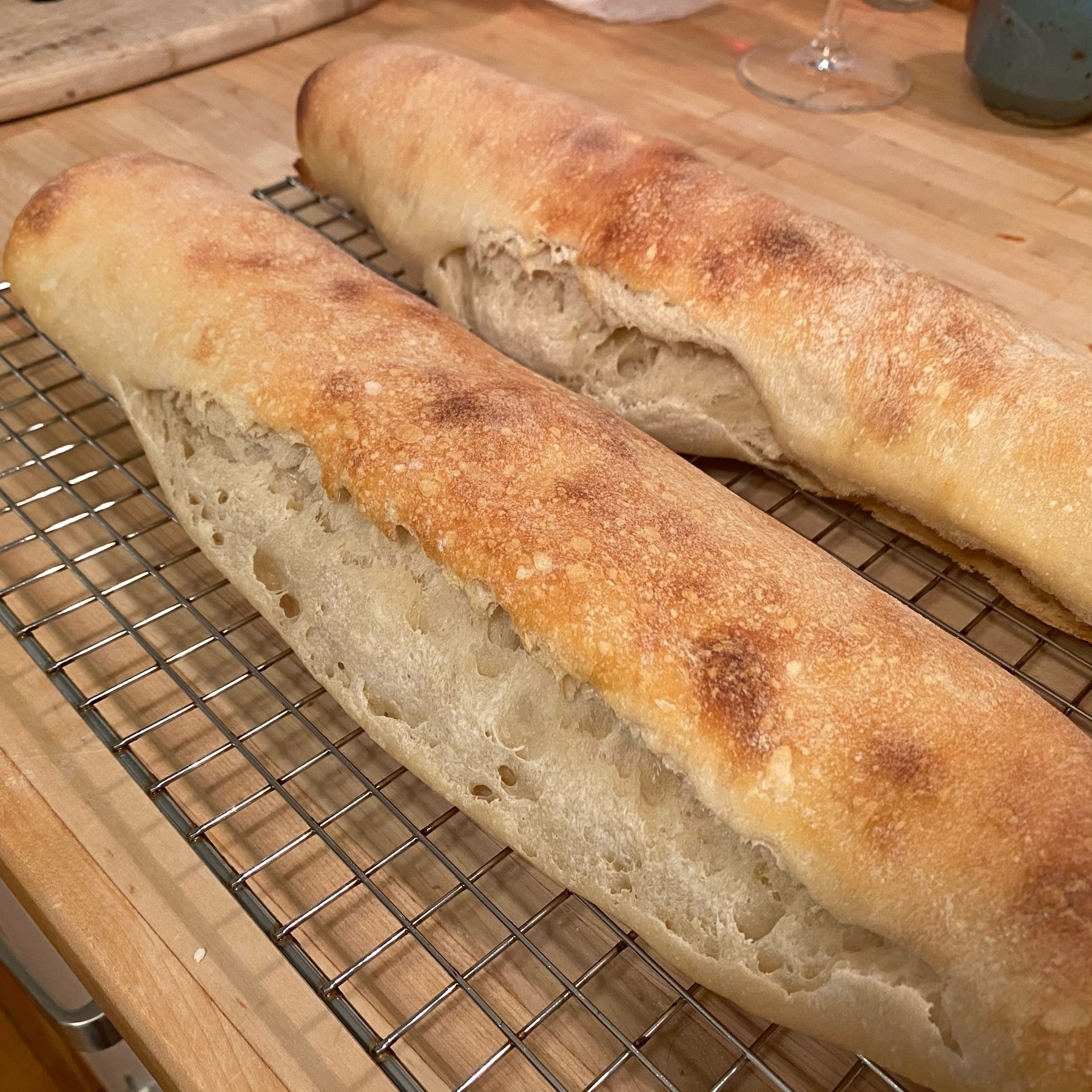 two baguettes with ruptured sides