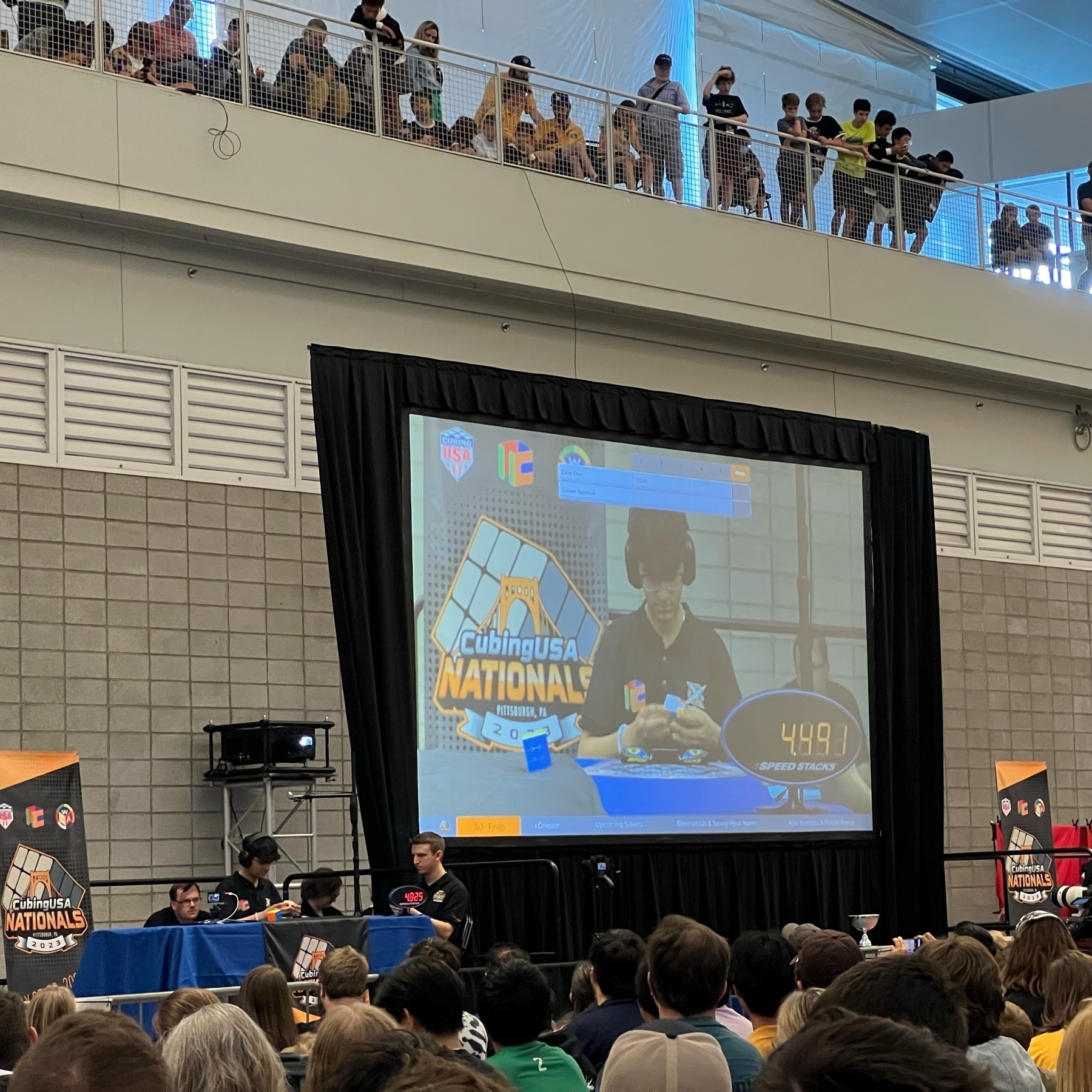stage at us national speed cubing competition with large display behind