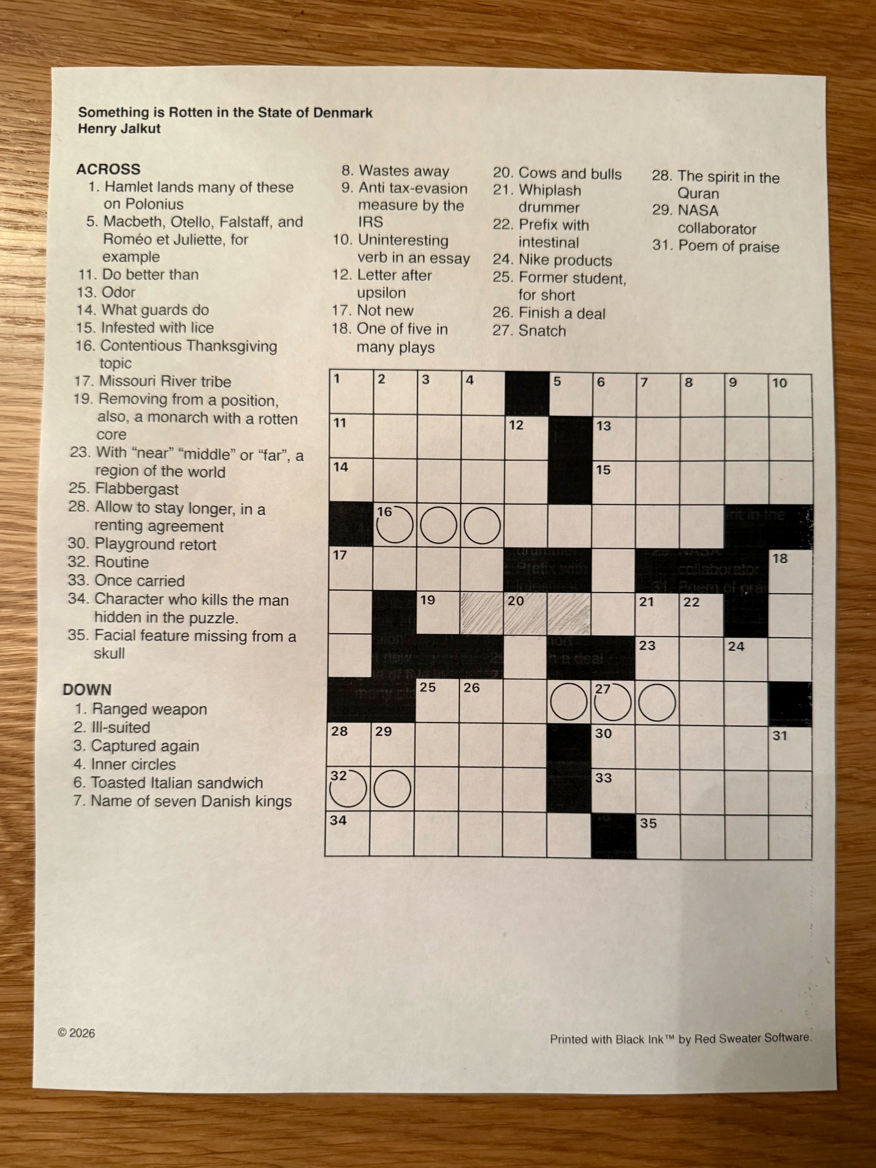 Picture of a sheet of paper with a crossword puzzle grid and full set of clues. Title "Something is Rotten in the State of Denmark". Shakespearean references in the clues.