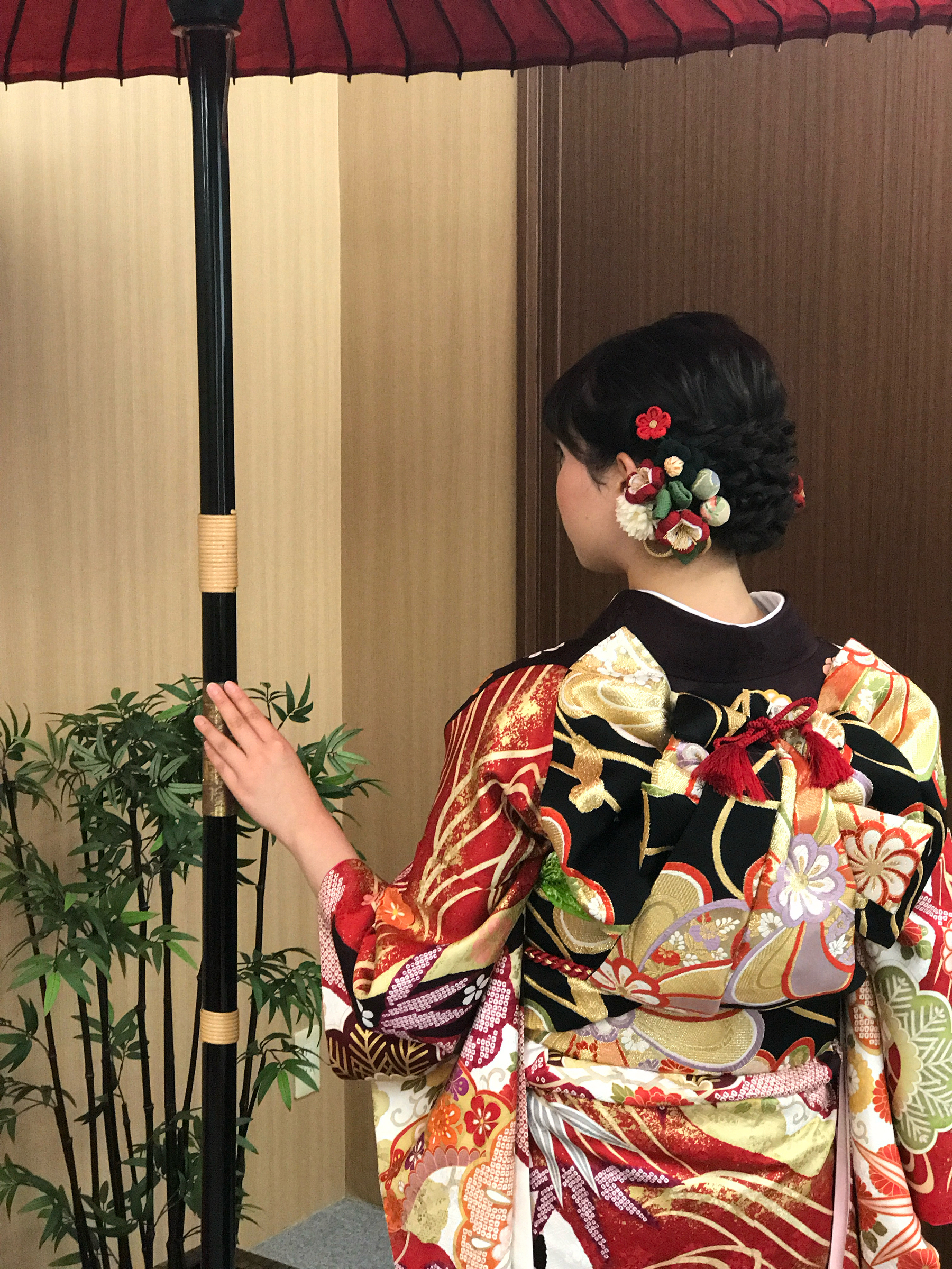 Photo of the back of a kimono showing the beautiful obi belt