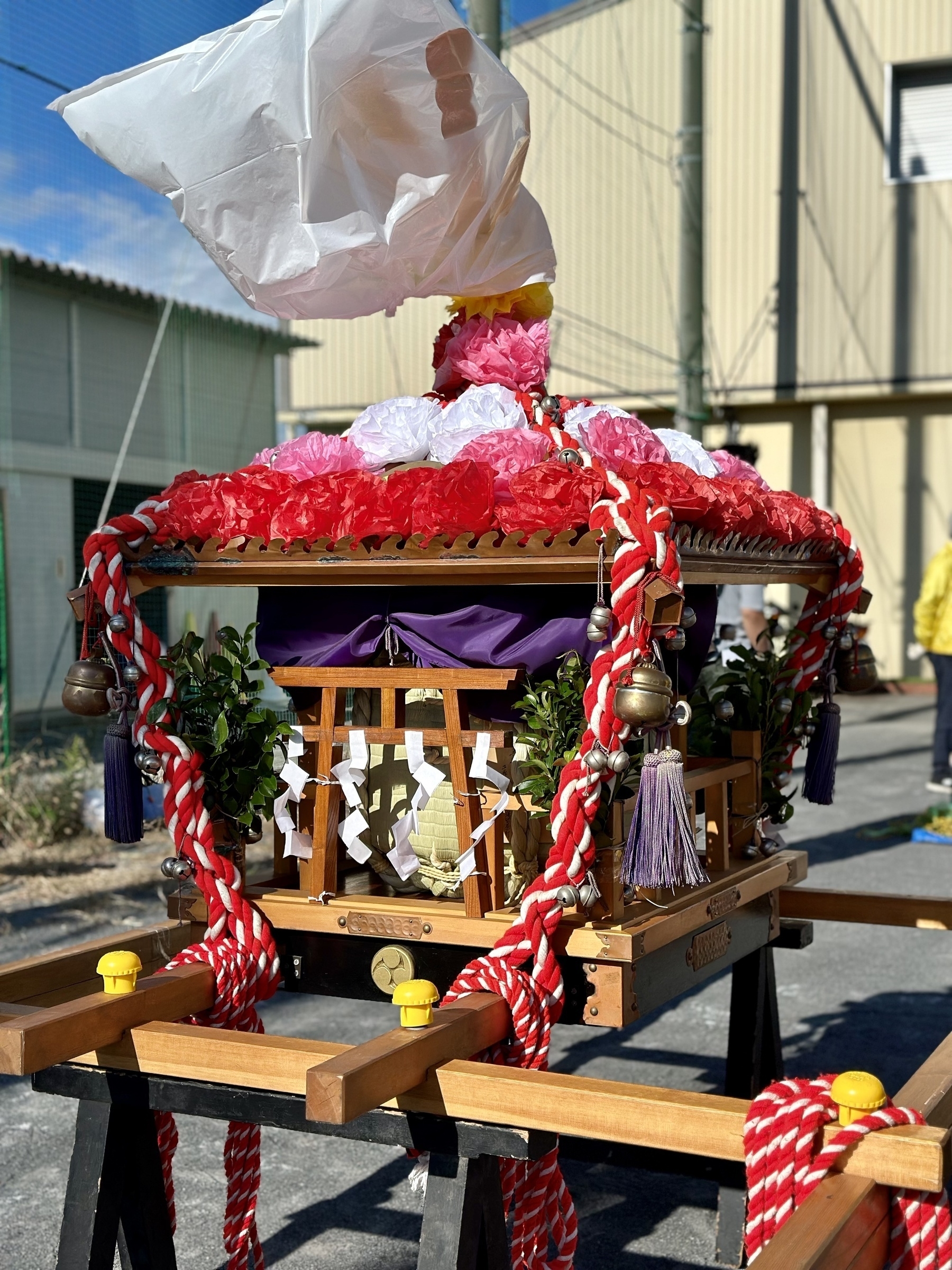Portable Shinto shrine with colorful decorations. 