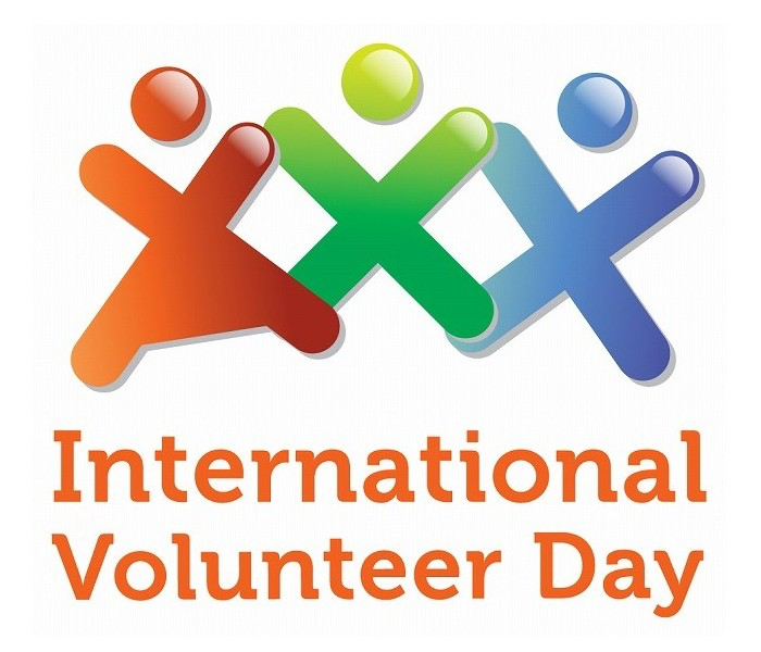 International Volunteer Day logo, with red, green and blue Xs that look like people. 