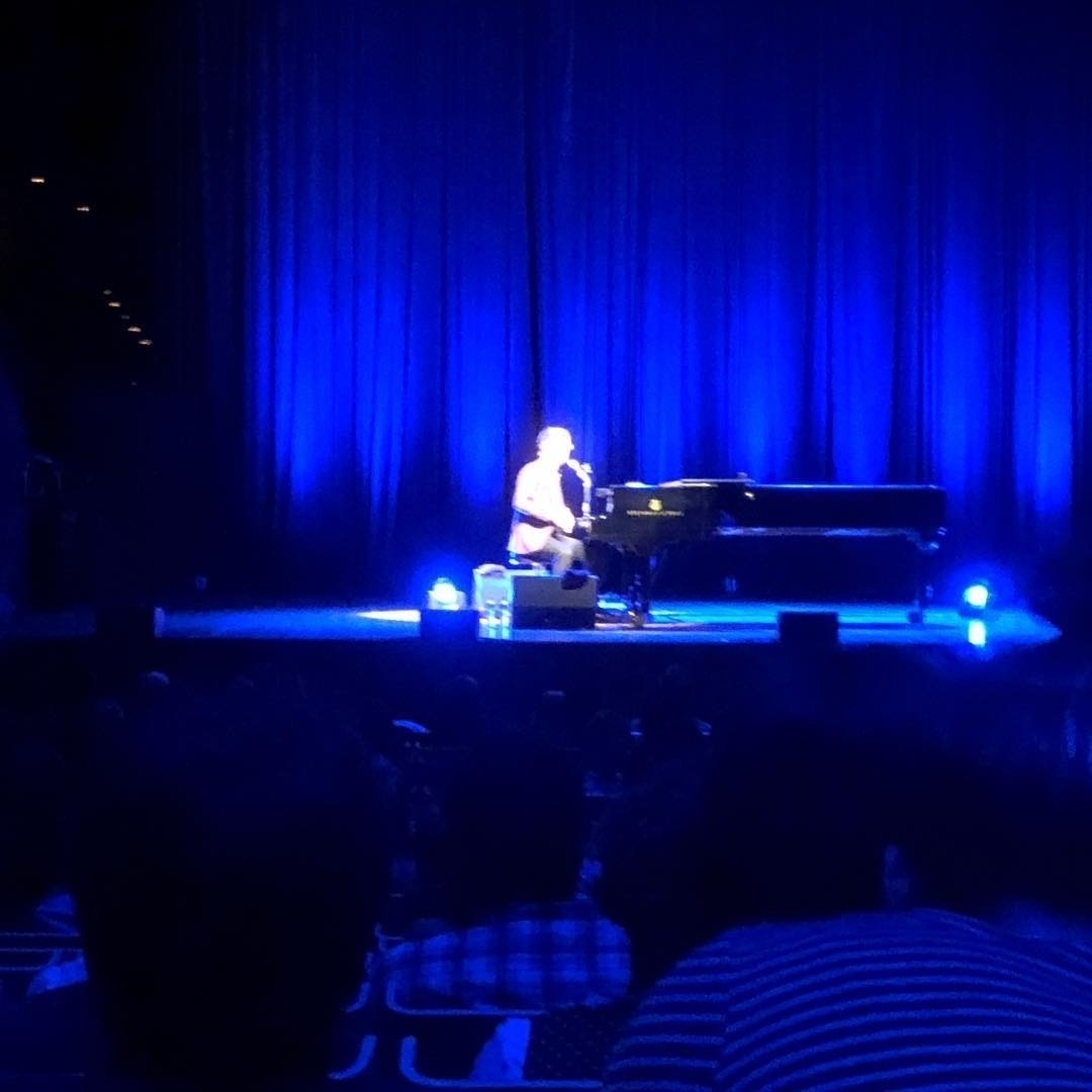 Blurry shot of Ben Folds playing piano at the Sydney Opera House