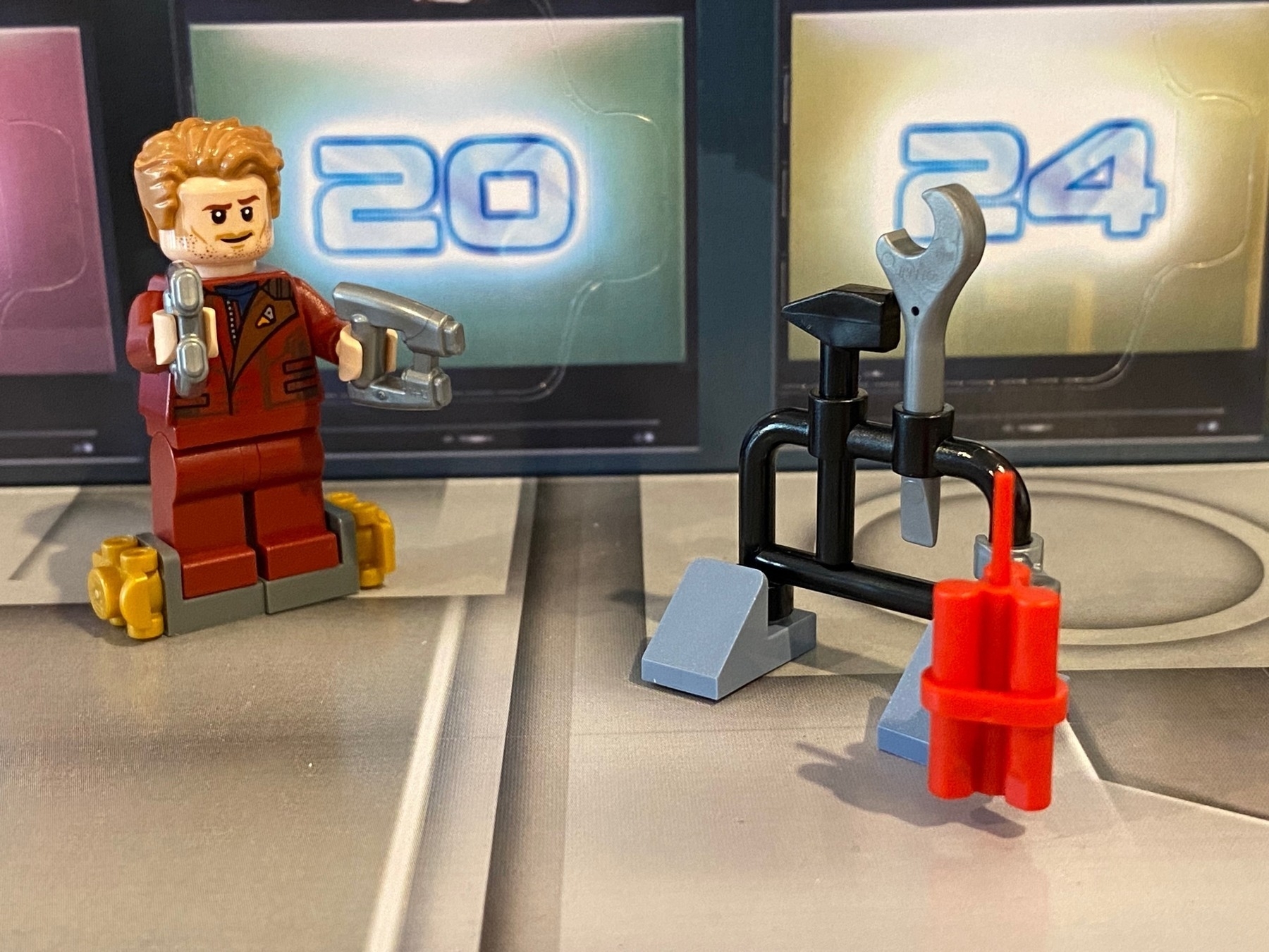 small tool rack from the Guardians of the Galaxy Lego advent calendar, with Star Lord mini gig behind