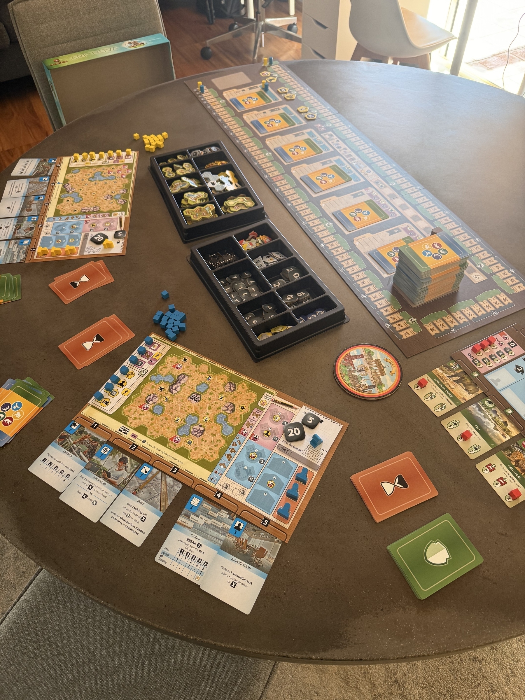 Setting up ark nova on my table for 2 players.
