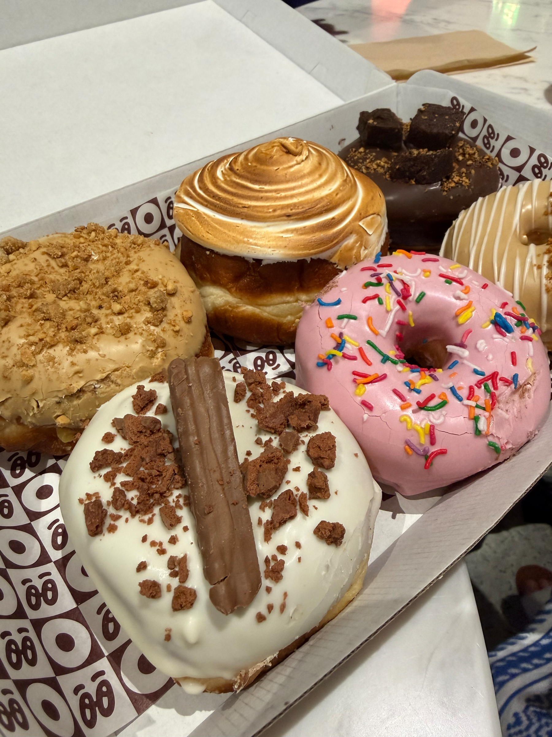 A tray of doughnuts. 