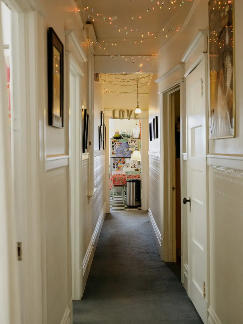 A photo of a hallway in a cozy apartment