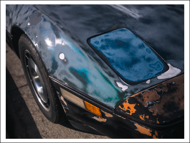 An artsy photo of a sportscar front bumper that has been sanded.