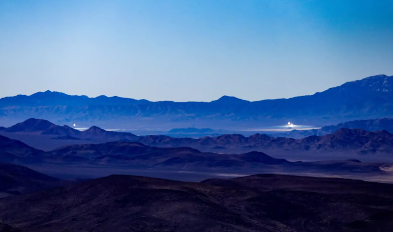 A photo of the pillars glowing in the desert, by the LA Times