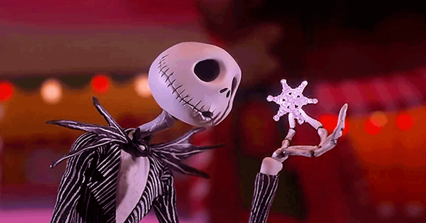 Jack Skeleton looks at a giant snowflake he's holding in his hand, a screen grab from the movie The Nightmare Before Christmas.