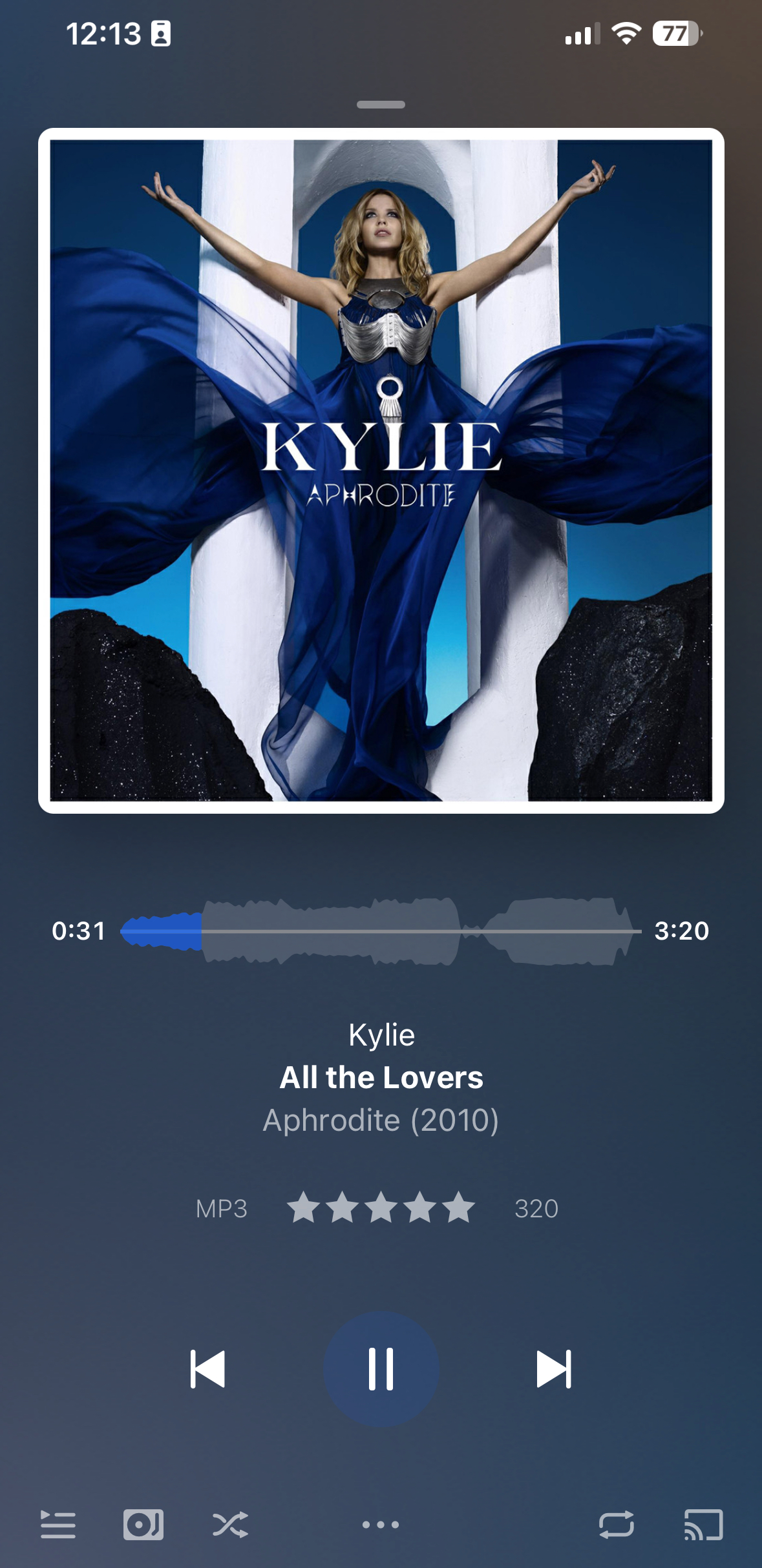 The screenshot shows a music player featuring the song All the Lovers by Kylie from the album Aphrodite, displaying album art, playback controls, and a rating system.