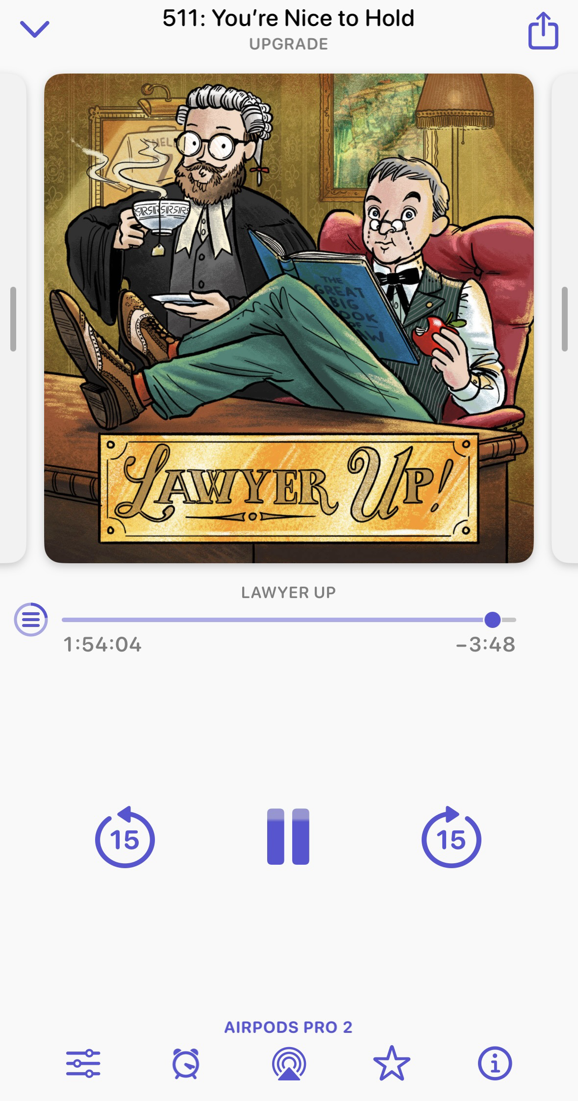 wo animated men are lounging with a book and tea inside a cozy room; a podcast interface surrounds them. Text: '511: You are Nice to Hold,' 'LAWYER UP,' '1:54:04.'