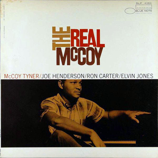 cover image for McCoy Tyner's album The Real McCoy, showing the pianist sitting at the keyboard, sleeves rolled up, looking off to one side (Joe Henderson on saxophone, Ron Carter on bass, Elvin Jones on drums)
