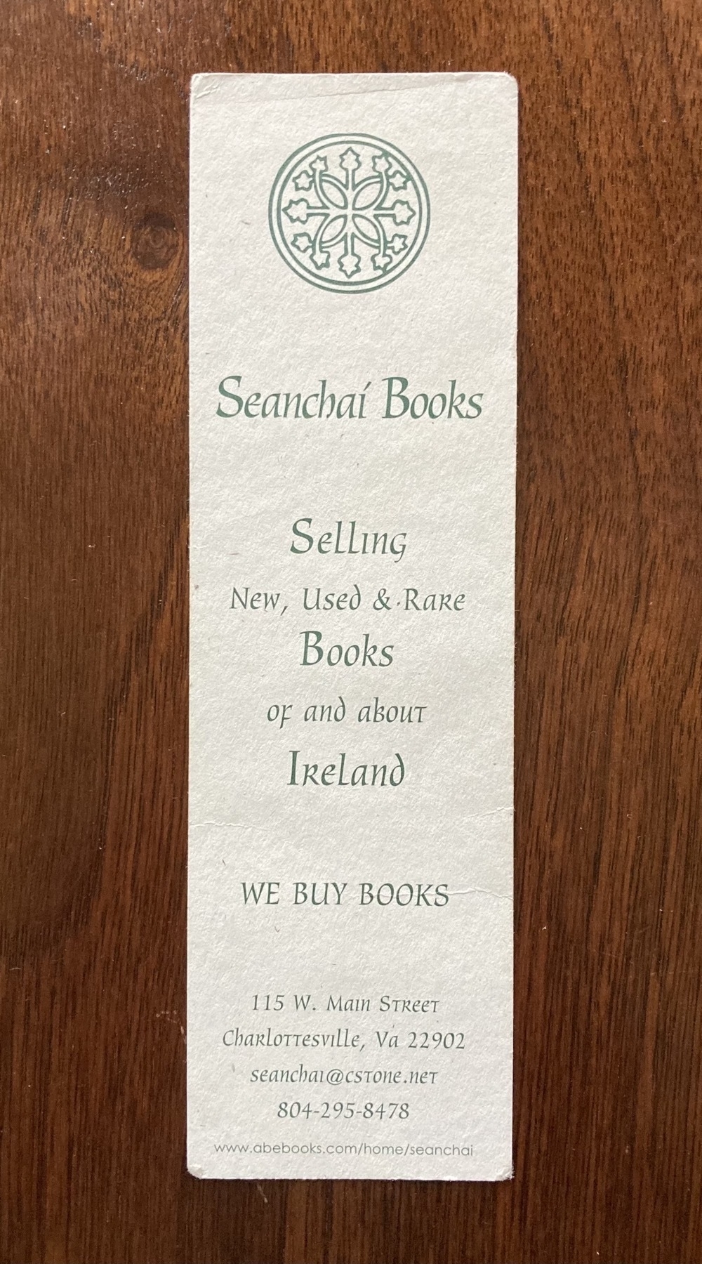 A bookmark from Seanchai Books in Charlottesville VA. The text reads, Selling new, used, and rare books of and about Ireland. We Buy Books.
