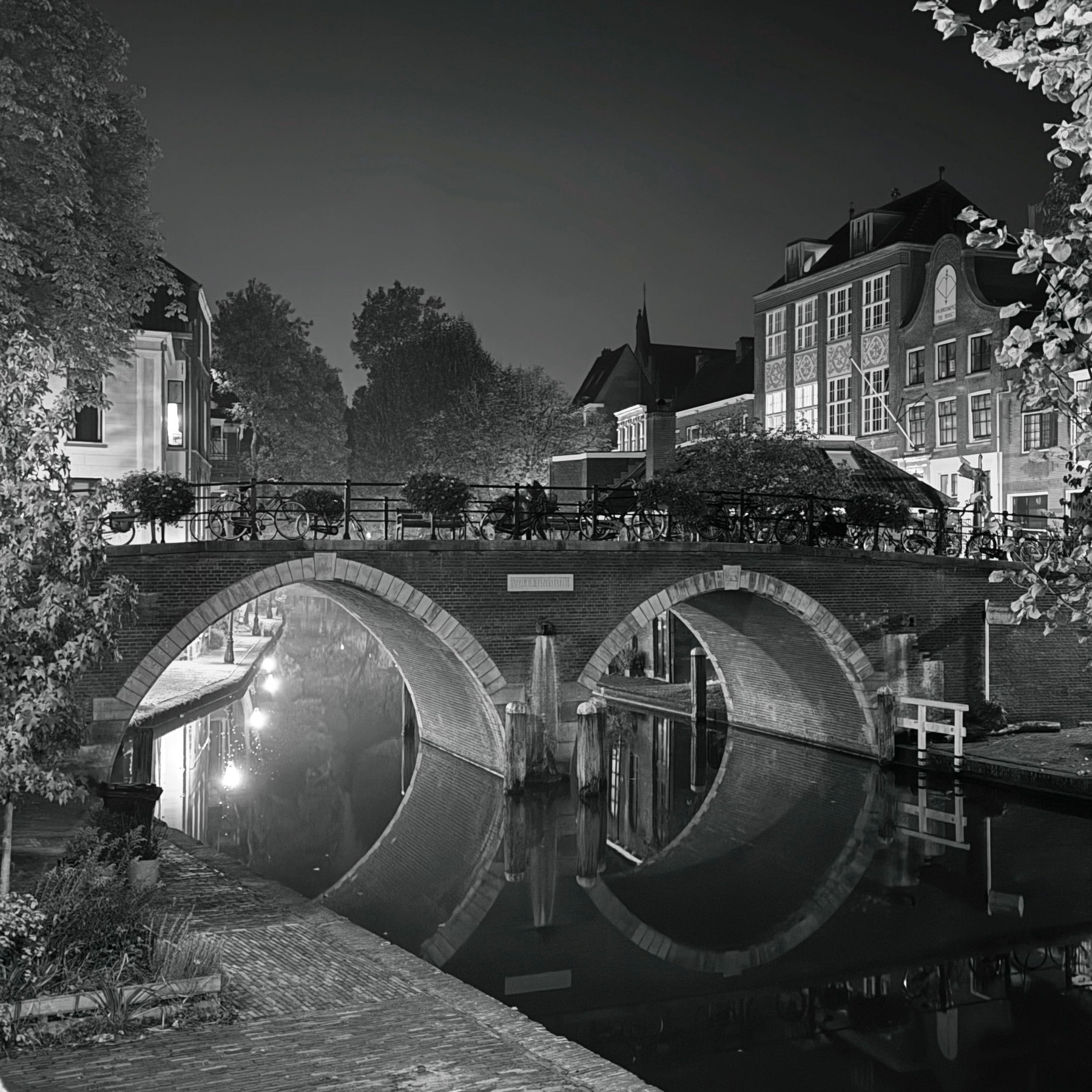 Monochrome view of a bridge with two arcs