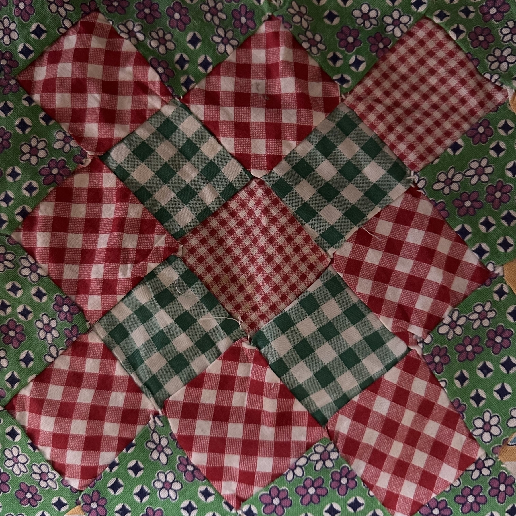 Moms hand sewn patchwork quilt piece.