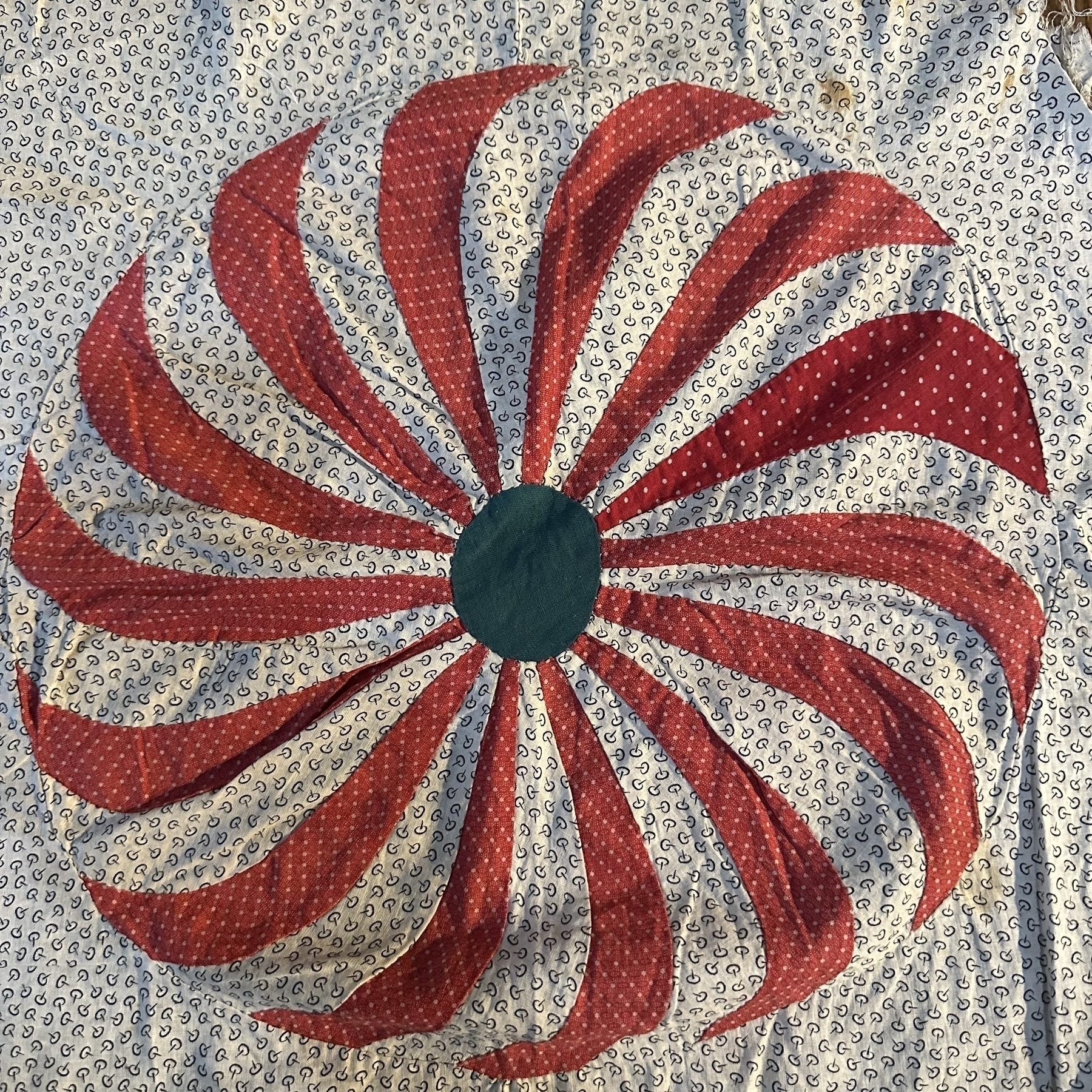 Mom’s hand sewn quilt piece, pinwheel design.