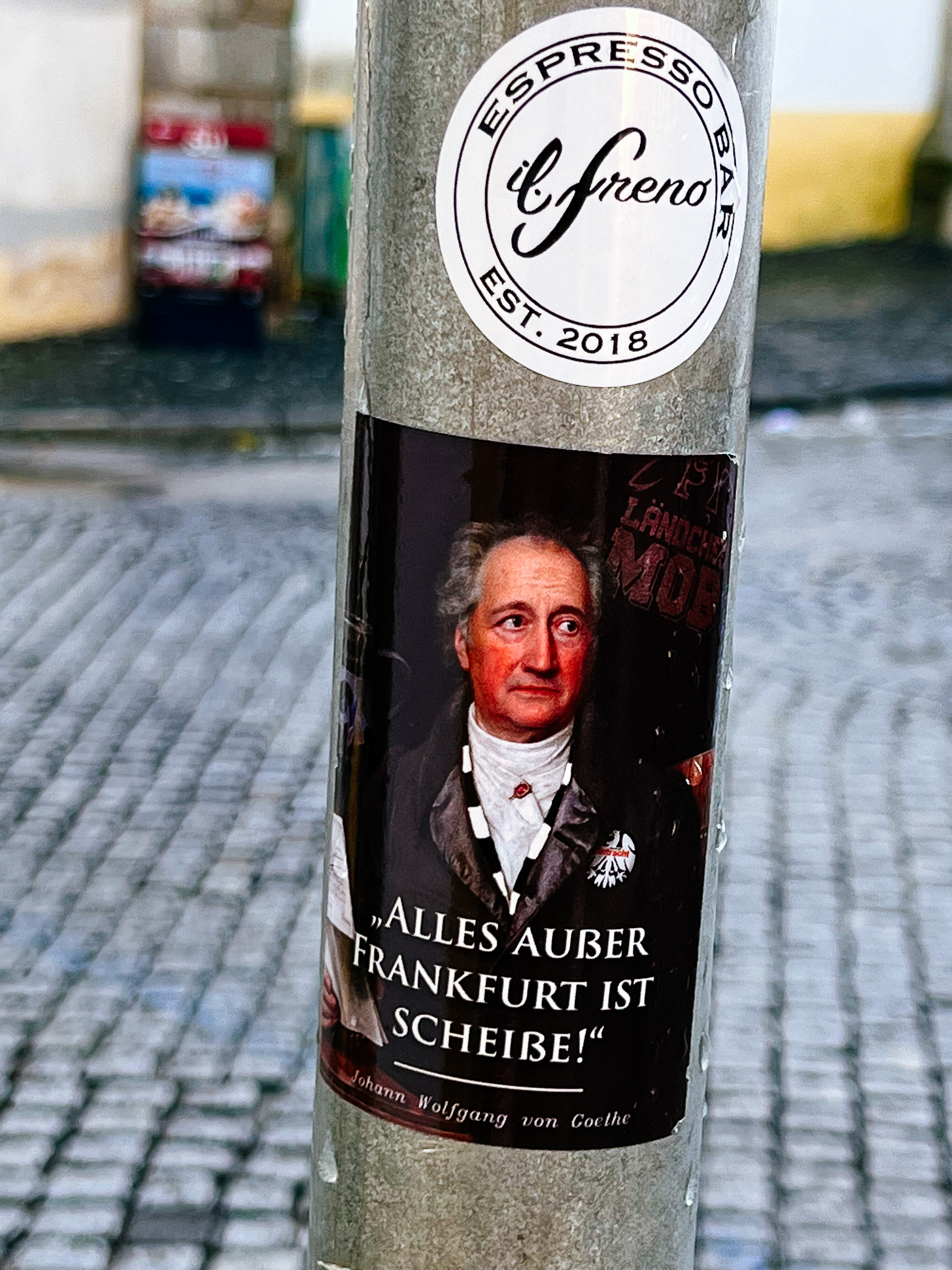 Sticker with a very classic looking German fellow, and the words “Alles außer Frankfurt istscheiße” below his picture. 