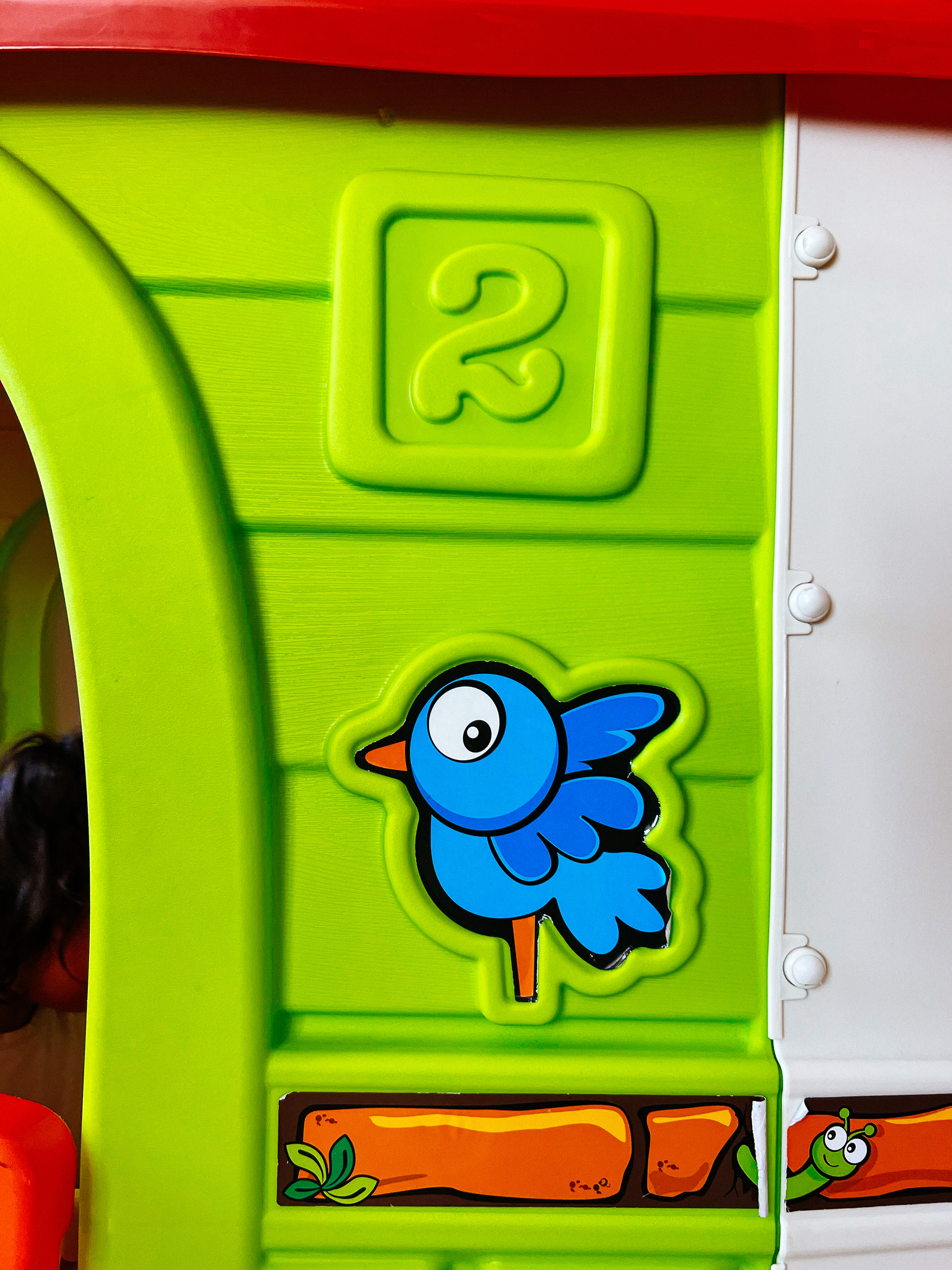 Sticker of a cartoon blue bird.