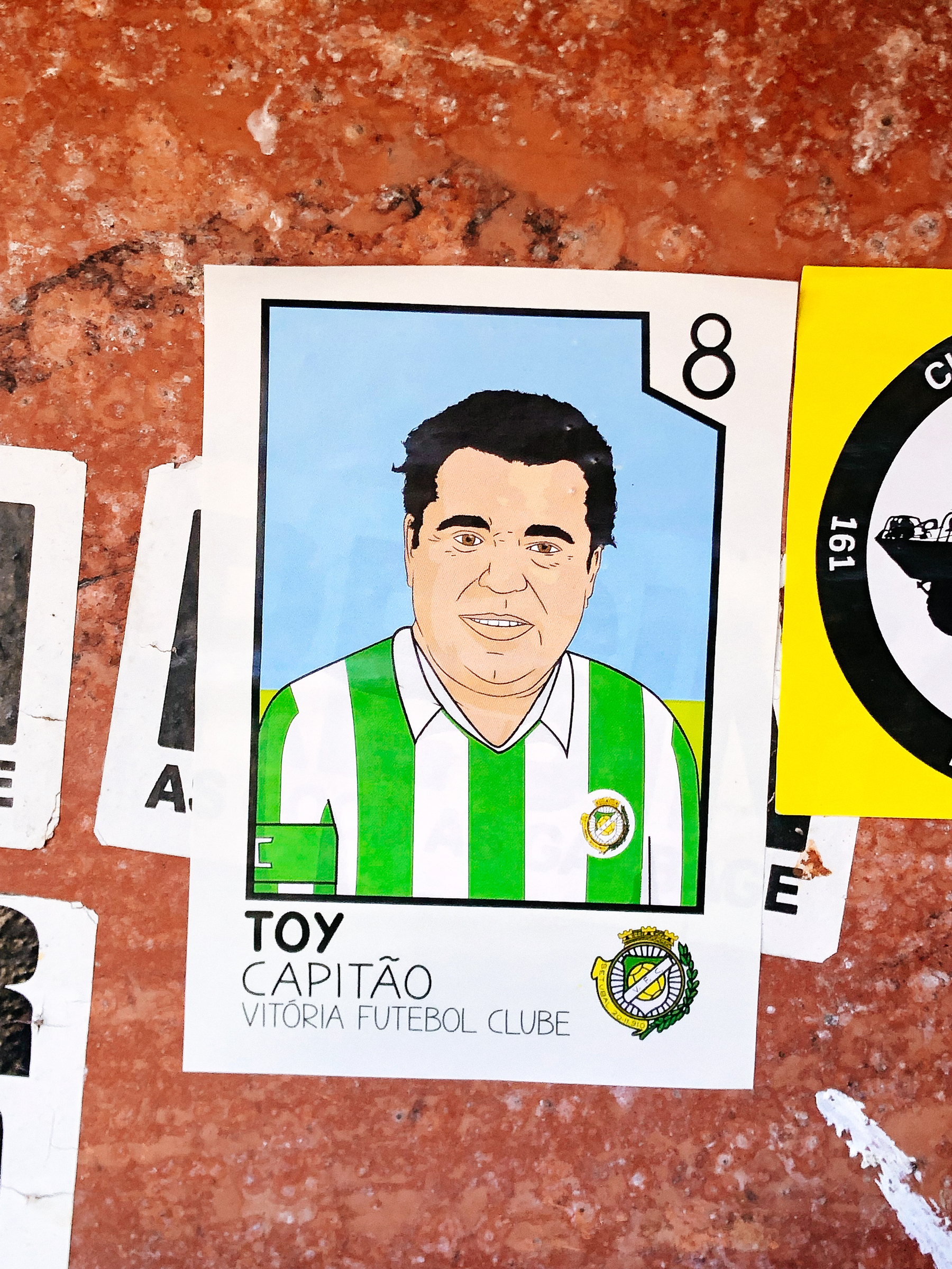 Sticker of a trading card with a drawing of a player named Toy. Toy is, in fact, a singer. 