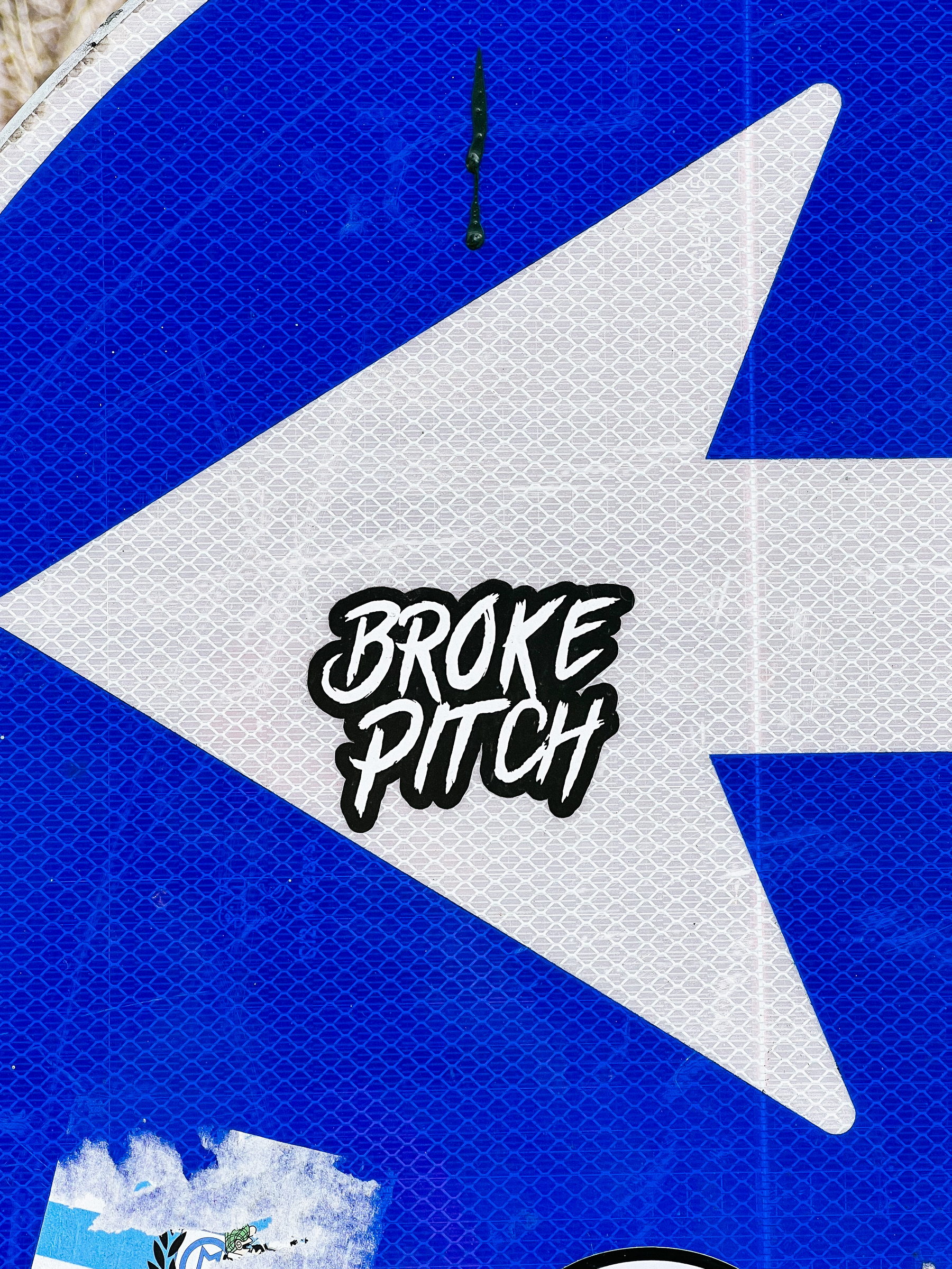 Sticker with “Broke Pitch”. 
