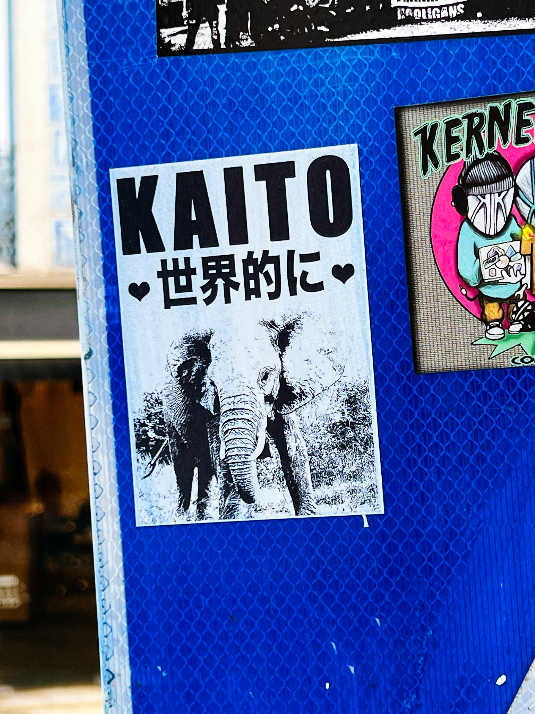 Black and white sticker with an elephant and the word “Kaito”. 