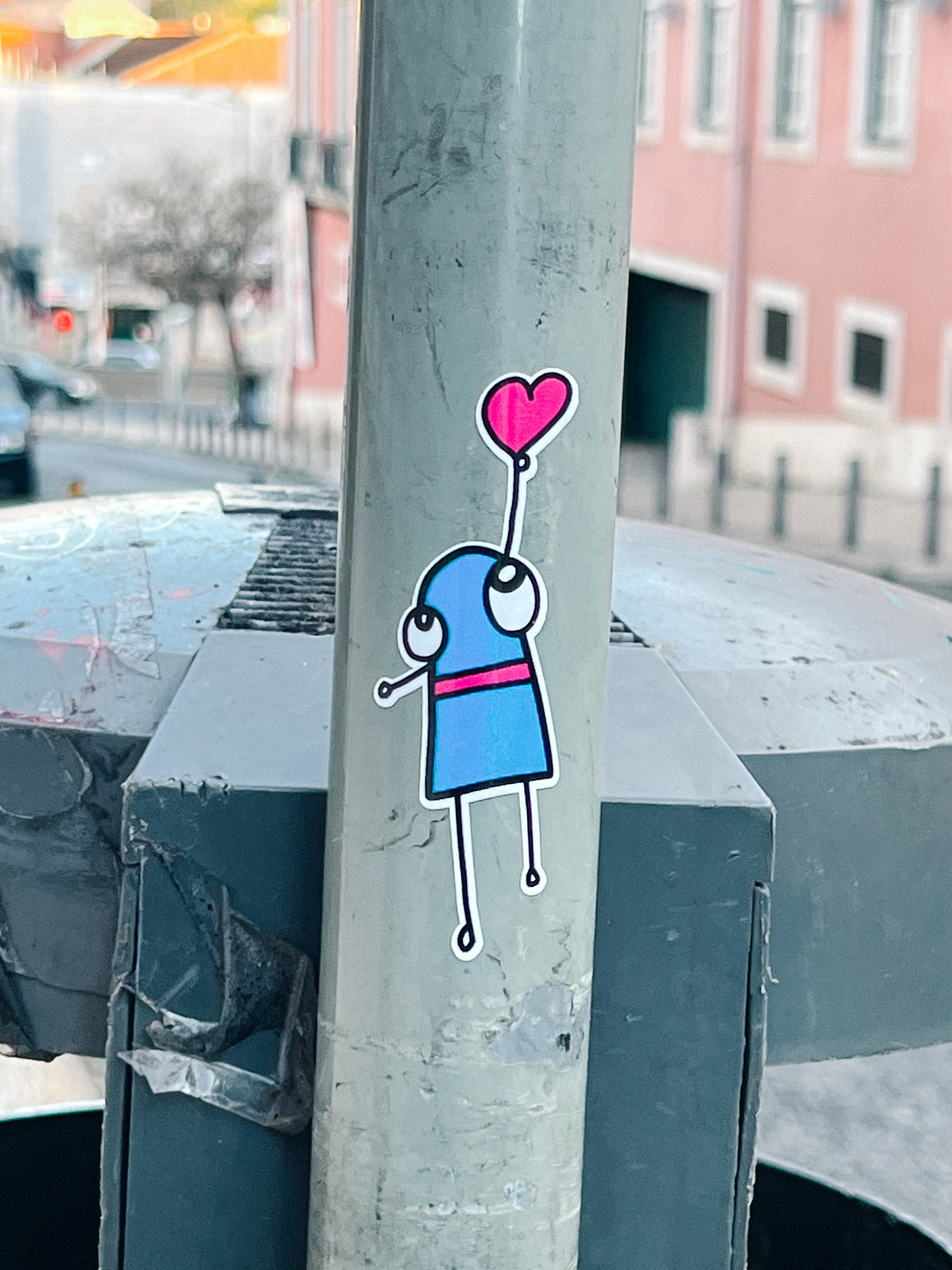 Sticker of a cute character reaching for a heart. 