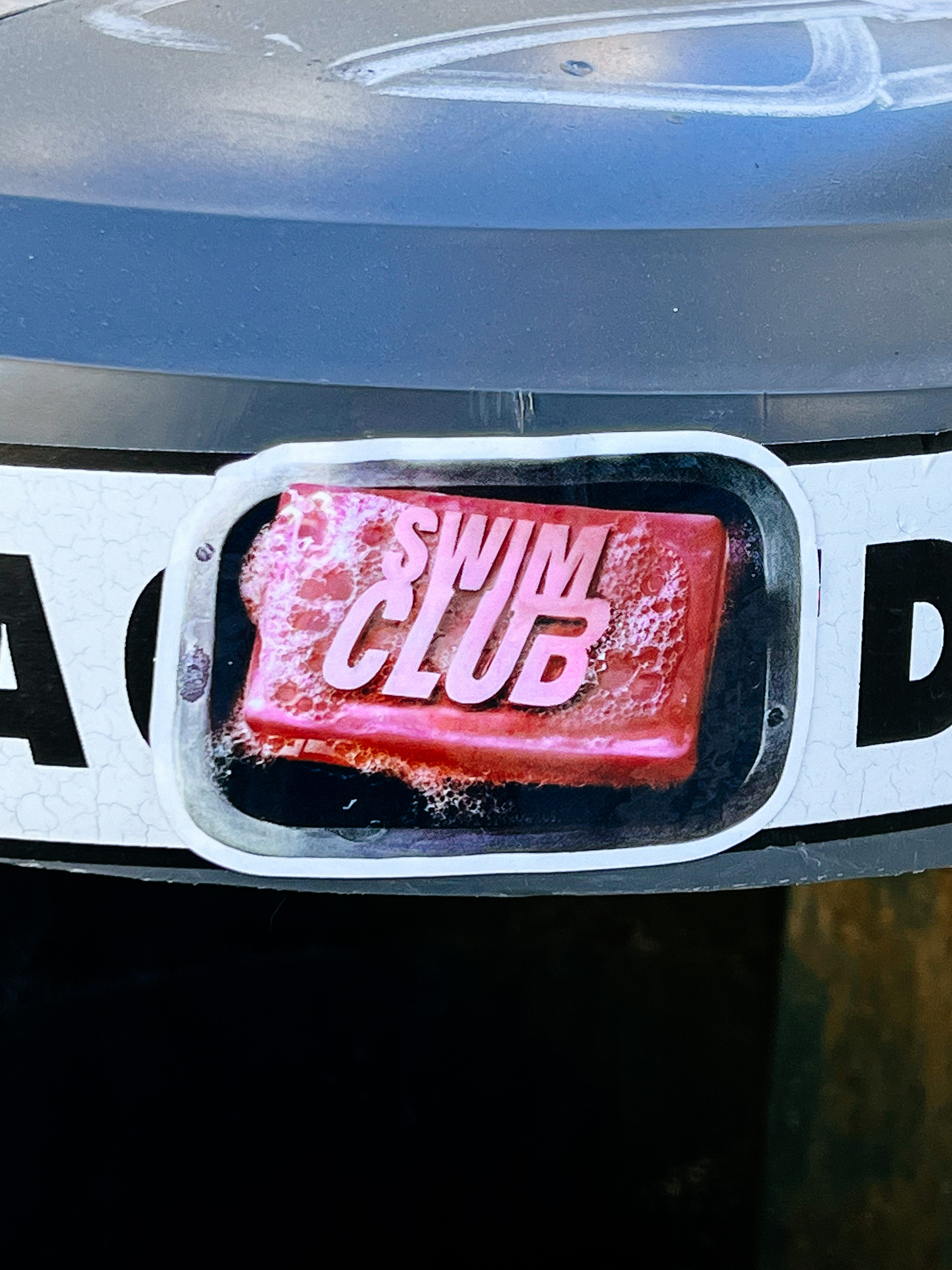 Sticker with a bar of soap with the words “Swim Club”, a parody of the classic “Fight Club” image. 