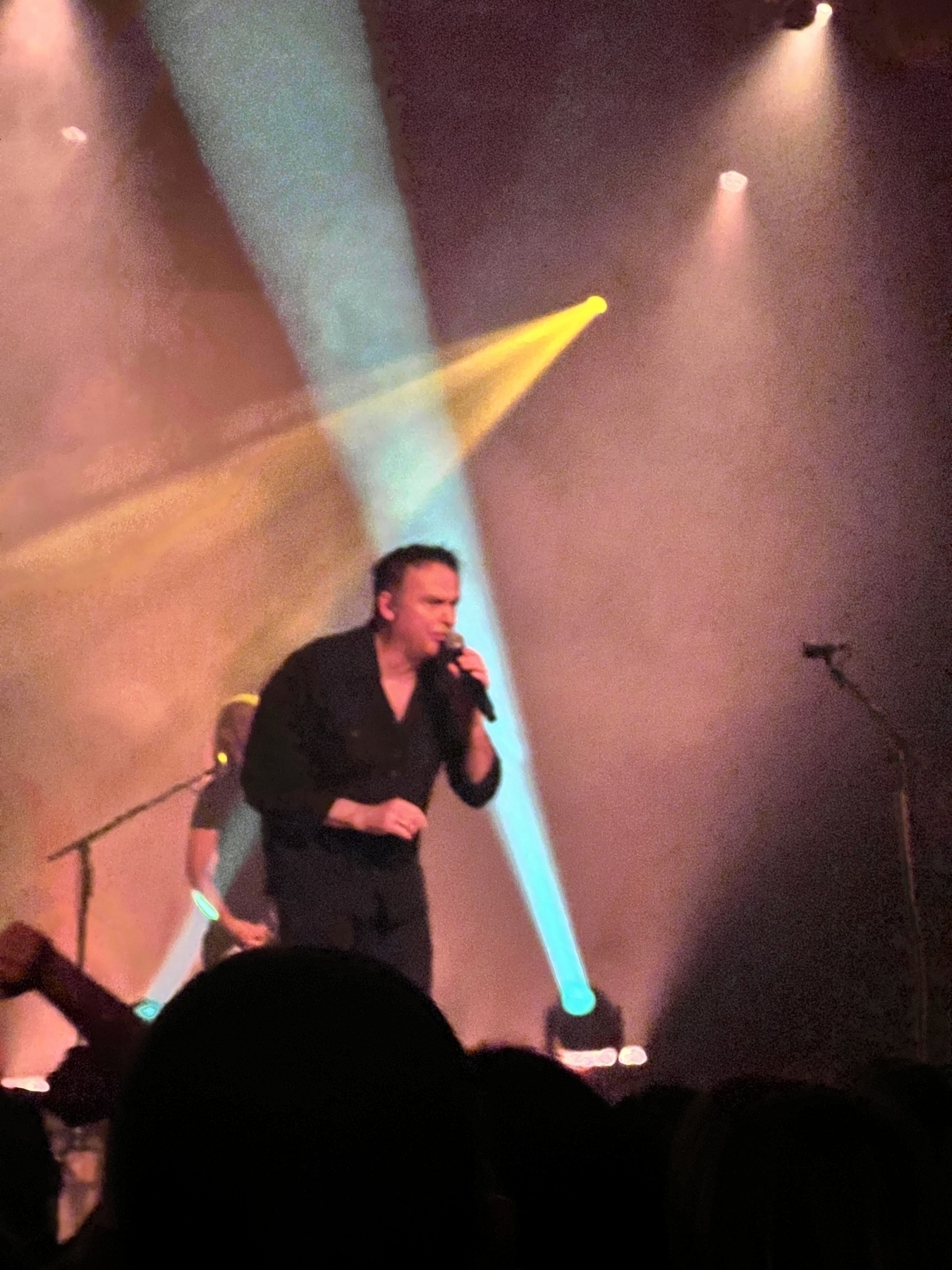 Hansi Kürsch singing into a microphone