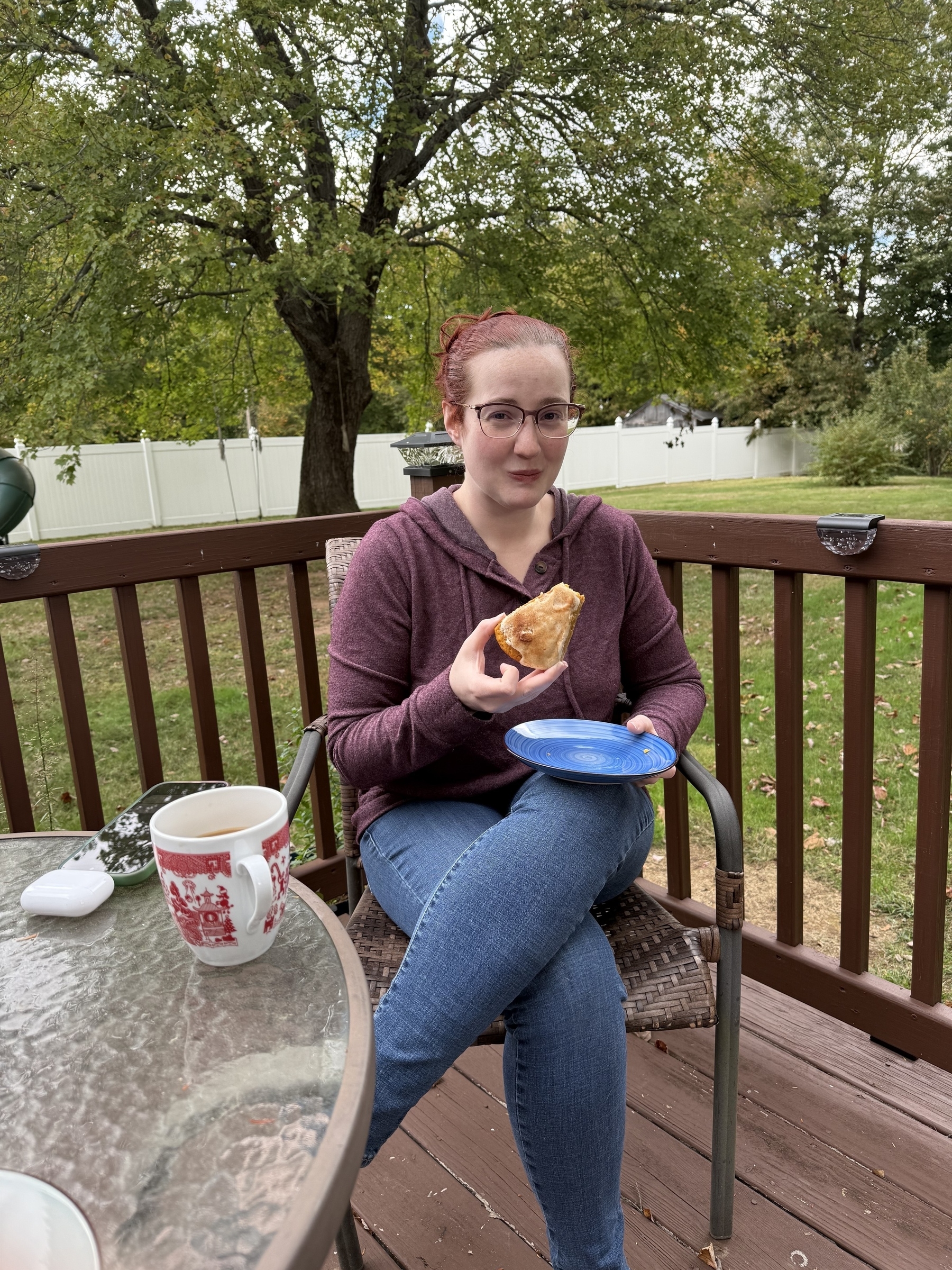 Woman eating a scone 