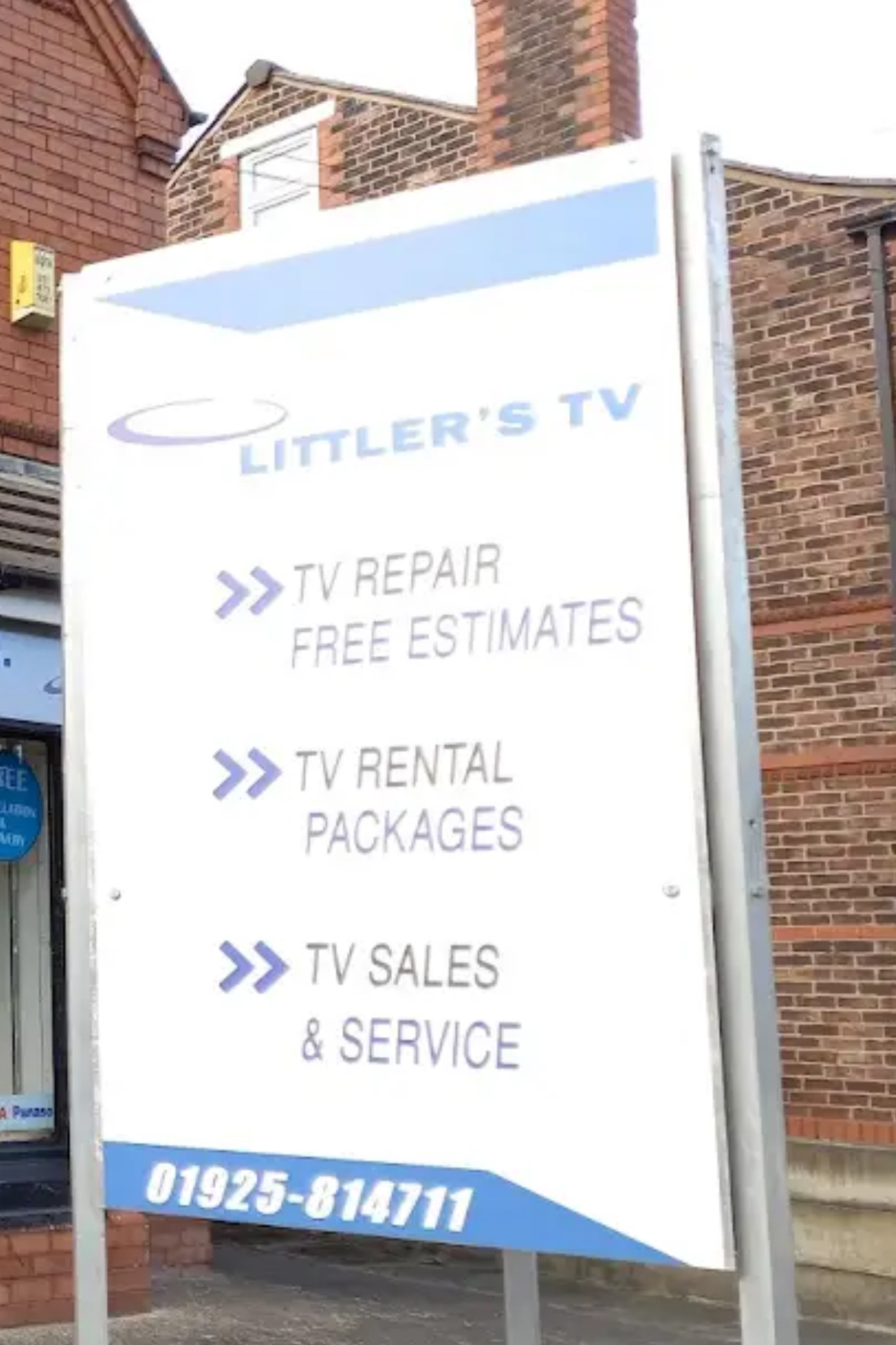 A sign for "Littler's TV" advertises TV repair, rental packages, and sales and service, along with a contact number.