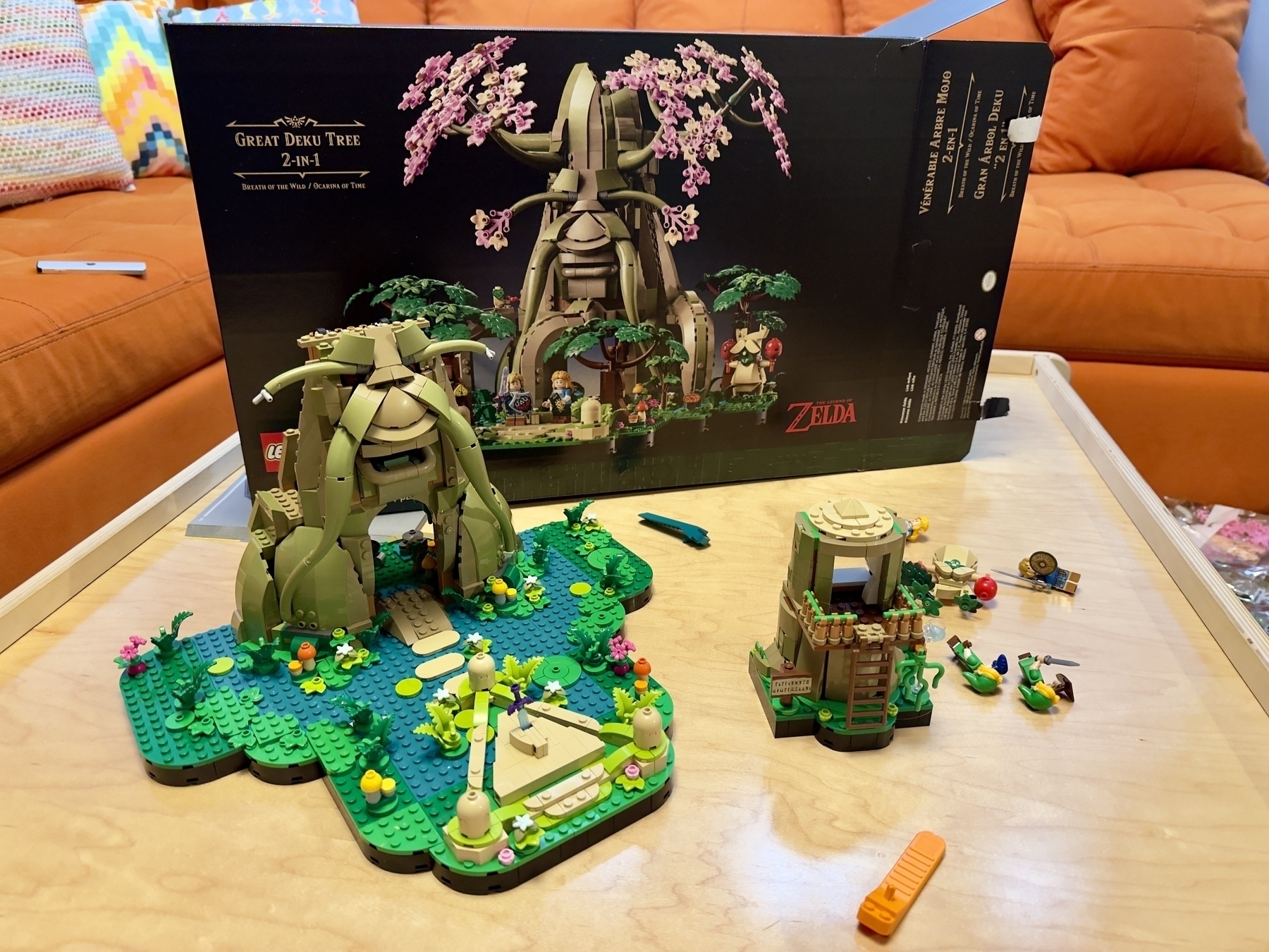 A LEGO set depicting the Great Deku Tree from The Legend of Zelda series is assembled on a table, with its box in the background.