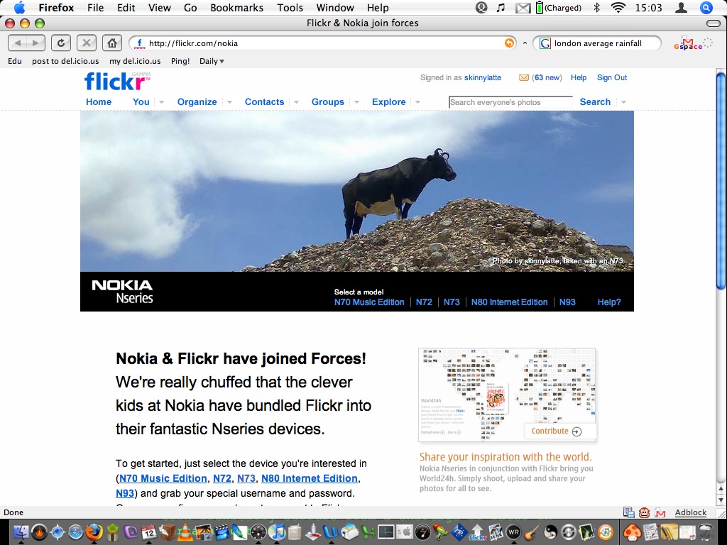 a screenshot of a browser showing the cow photo on flickr.com's front page in the early 2000s