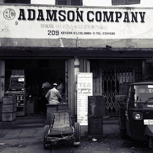 A black and white photo of a commercial area in Colombo, Sri Lanka
