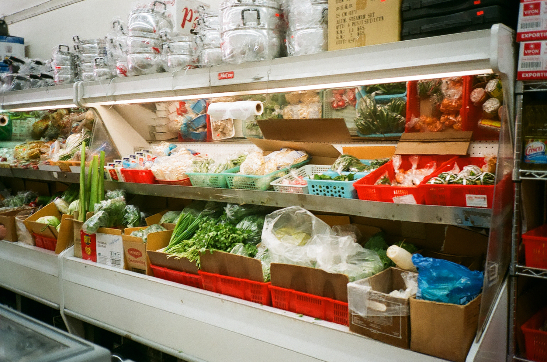 a color photograph of the fridge section at a Cambodian grocery store in Little Saigon, San Francisco